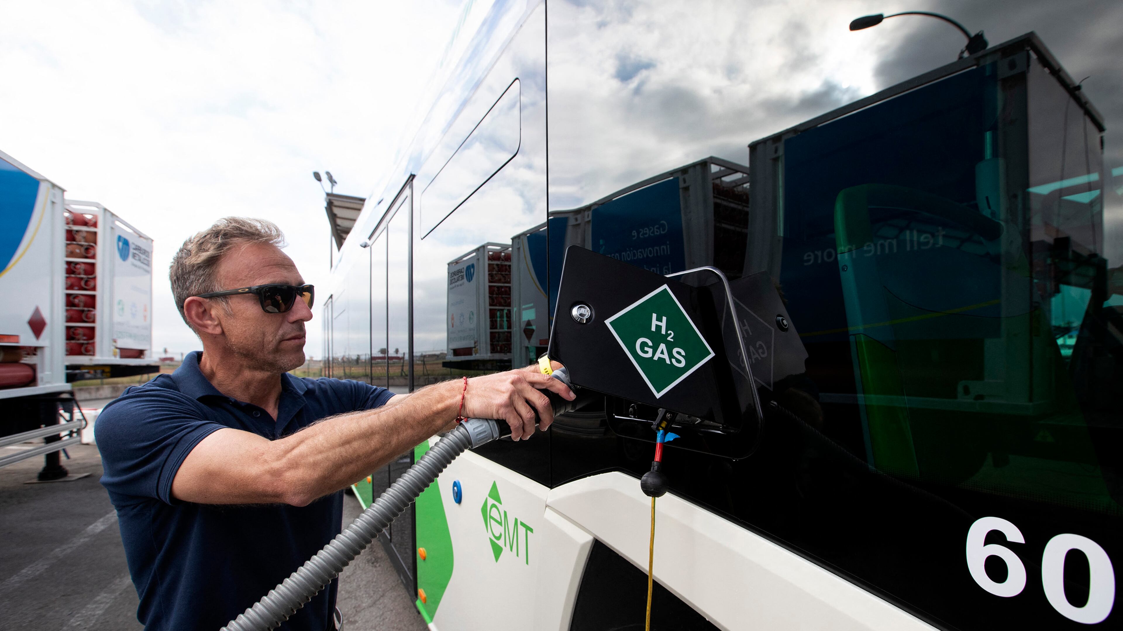 A driver fills the tank of an urban bus with green hydrogen at the bus depot of the municipal transport company in Palma de Mallorca on April 12, 2023. (Jaime Reina/AFP/Getty Images/TNS)