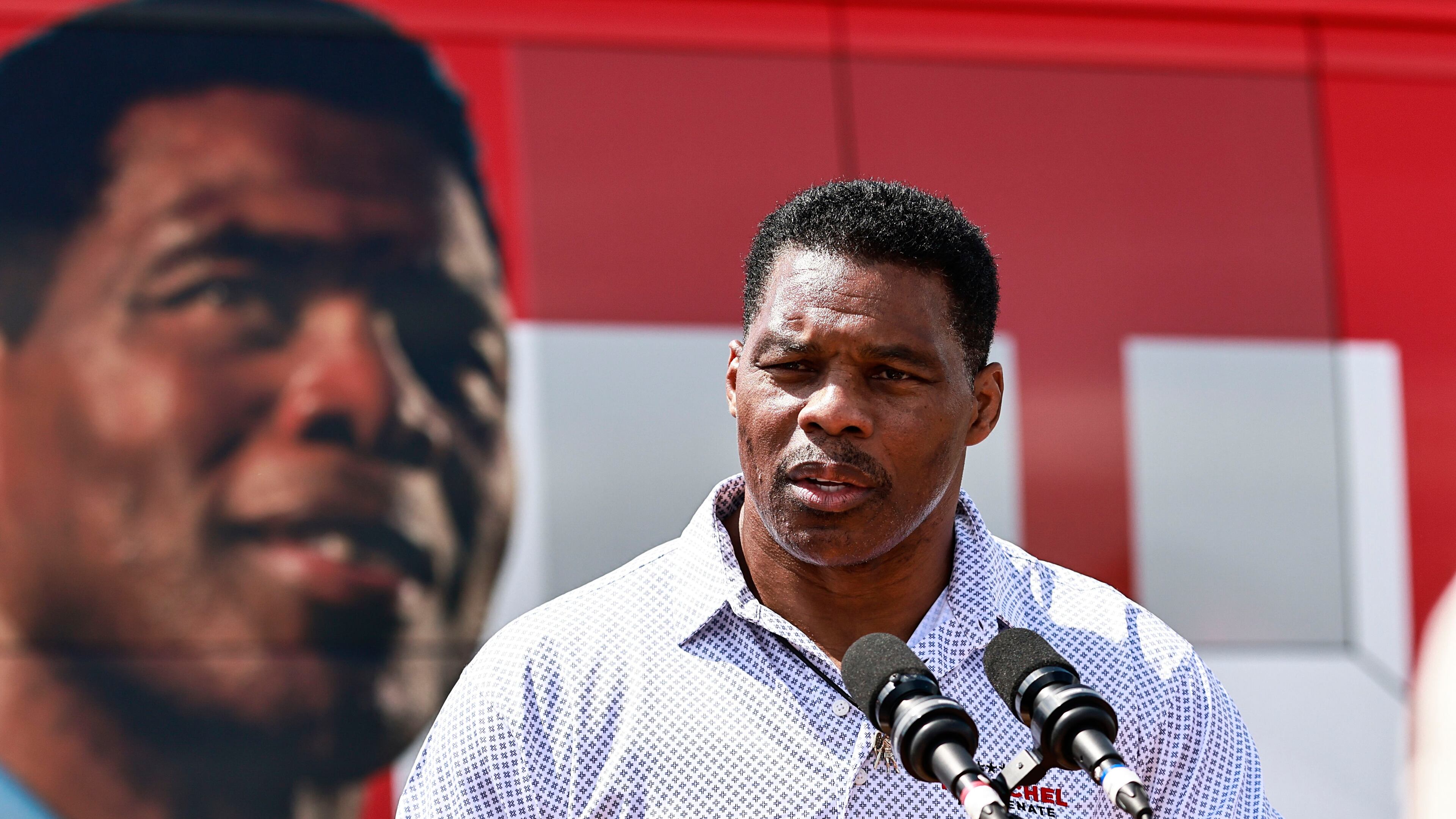 Republican U.S. Senate candidate Herschel Walker speaks to a crowd of voters while campaigning in Emerson, Ga. on Wednesday, Sept. 7, 2022. (Natrice Miller/The Atlanta Journal-Constitution/TNS)