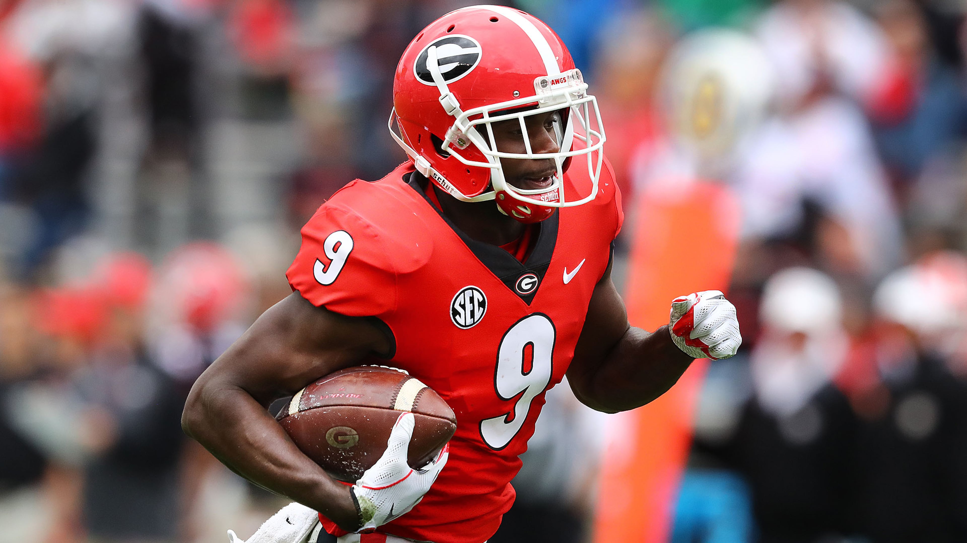 Georgia wide receiver Jeremiah Holloman breaks away for a touchdown after the reception during the annual G-Day football game on Saturday, April 20, 2019, in Athens. Curtis Compton/ccompton@ajc.com