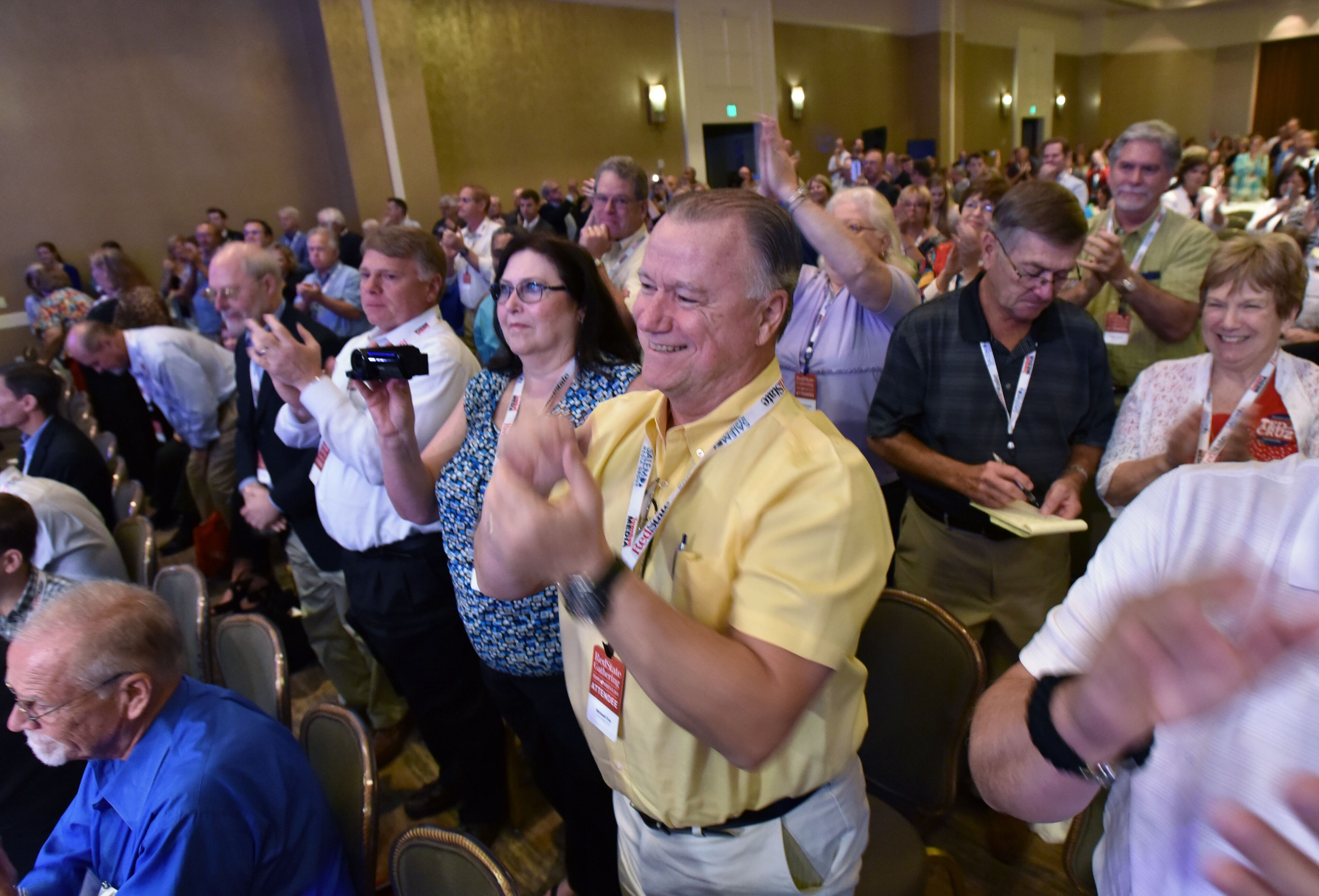 August 8, 2015 Atlanta - Attendees react to Texas Sen. Ted Cruz's speech during the RedState Gathering at Intercontinental Buckhead Hotel on Saturday, August 8, 2015. The organizer of the RedState Gathering has rescinded the Republican presidential candidate’s invitation to speak at a Saturday evening rally at the College Football Hall of Fame. Erick Erickson said the billionaire’s comments about Fox News anchor Megyn Kelly were “a bridge too far.” Trump told CNN on Friday that “you could see there was blood coming out of her eyes. Blood coming out of her wherever” as she questioned him during Thursday’s Republican presidential debate.HYOSUB SHIN / HSHIN@AJC.COM