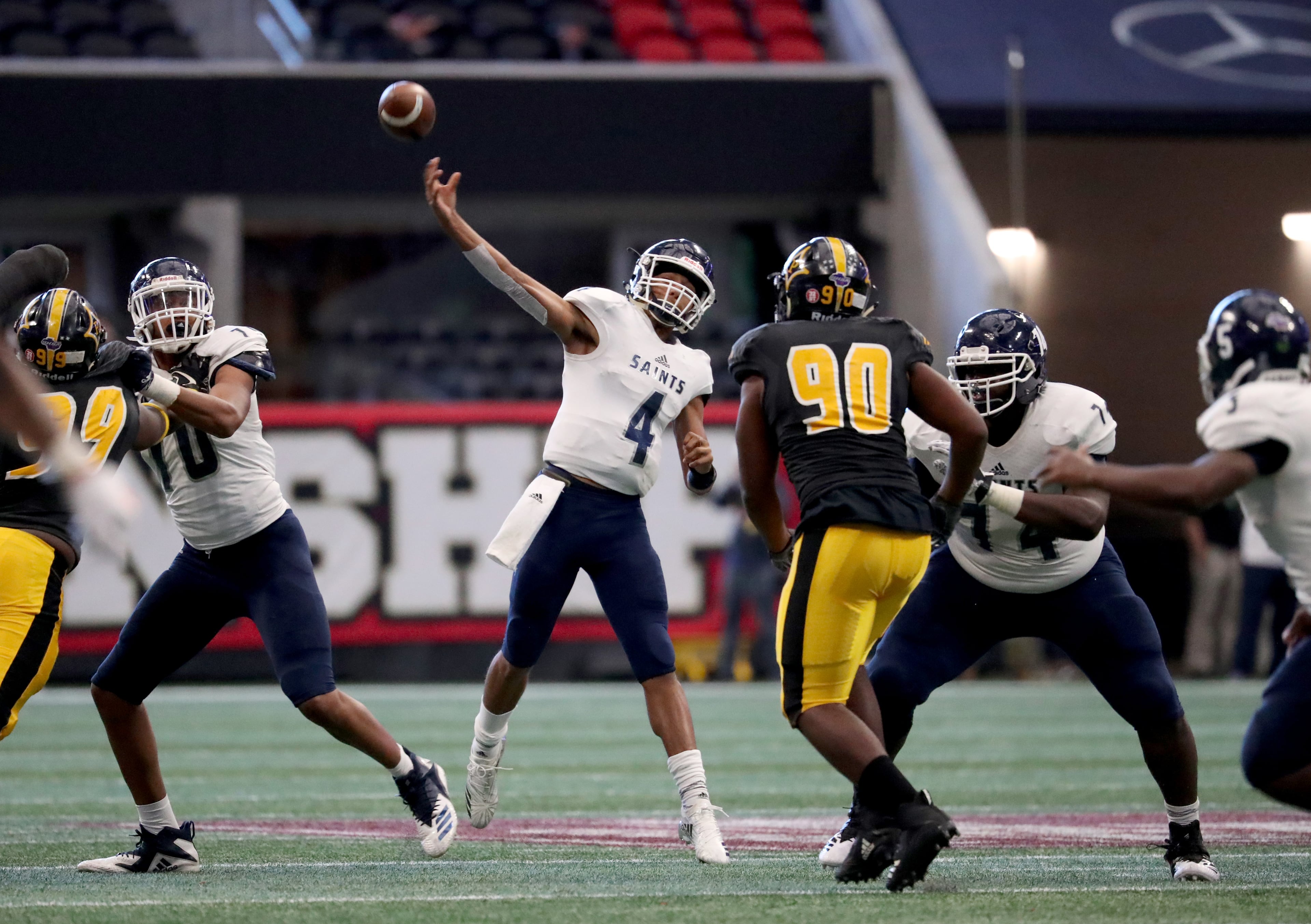 Cedar Grove quarterback Austin Smith (4) attempts a pass in the first half against Peach County in the Class AAA State Championship at Mercedes-Benz Stadium, Tuesday, December 11, 2018, in Atlanta. (Jason Getz/Special to the AJC)