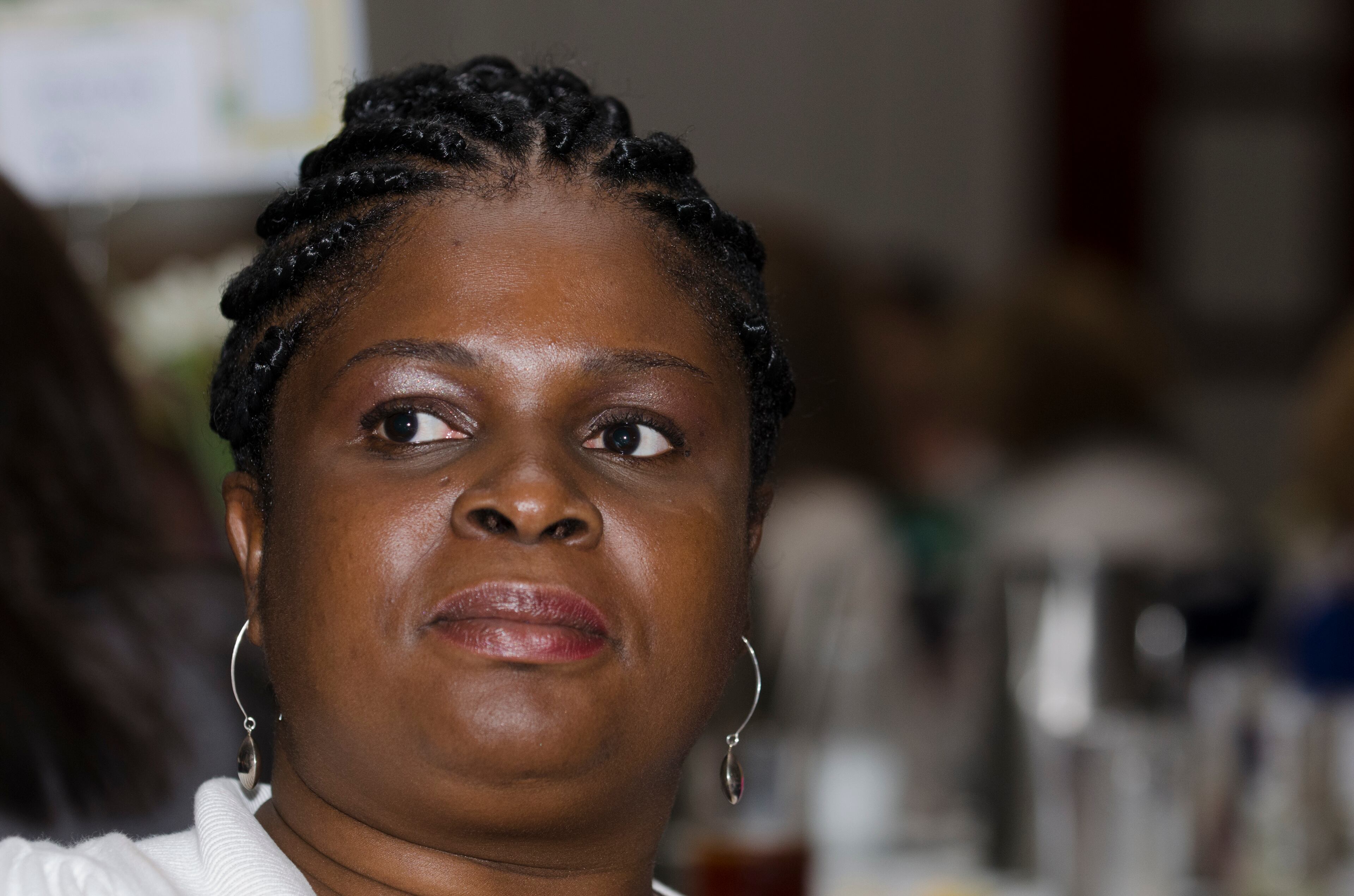 Sherene McDonold winner of Celebrating Nurses AJC Jobs Nursing Excellence Awards watches her video documentary the awards luncheon Tuesday, May 6, 2014 at the Cobb Galleria. (Photo by Barry Williams/Special)