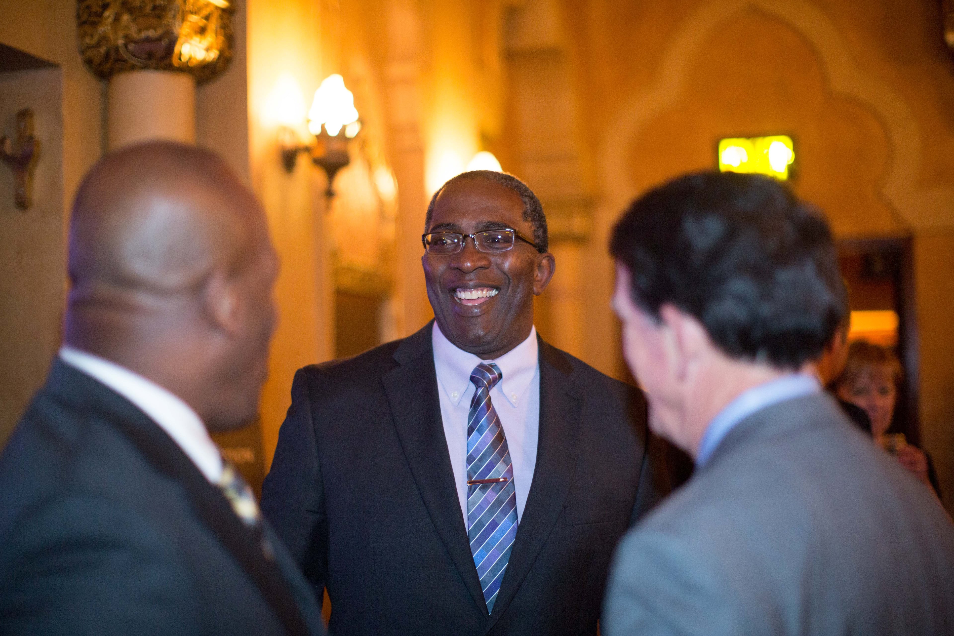 Scott Williams, center, talks with Kennesaw State Athletic Director Vaughn Williams, left, and UGA Athletic Director Greg McGarity, right, during the 10th annual Atlanta Sports Awards held at the Fox Theatre, Thursday, March 5, 2015, in Atlanta. (SPECIAL/BRANDEN CAMP)