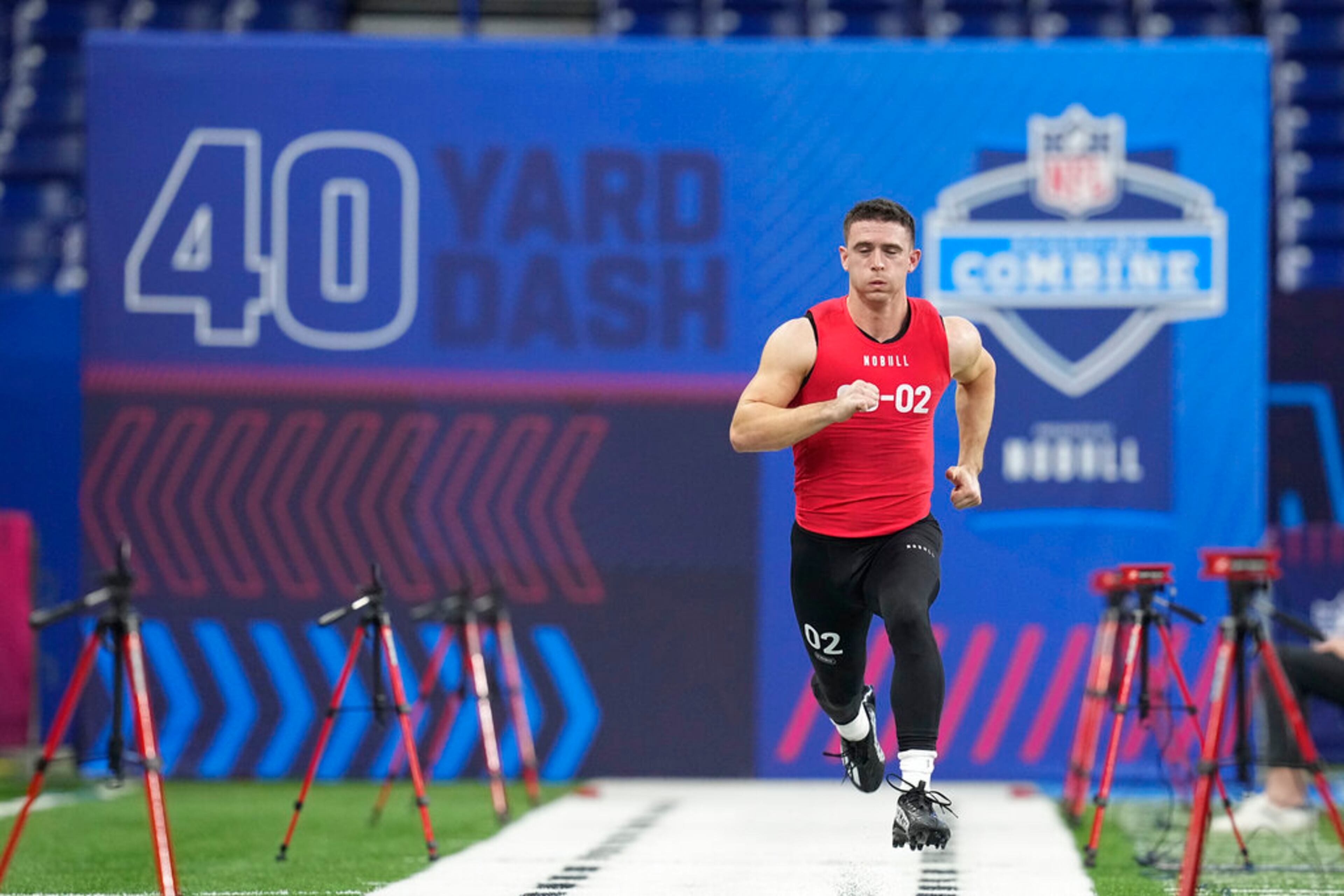 Georgia quarterback Stetson Bennett runs the 40-yard dash at the NFL football scouting combine in Indianapolis, Saturday, March 4, 2023. (AP Photo/Darron Cummings)