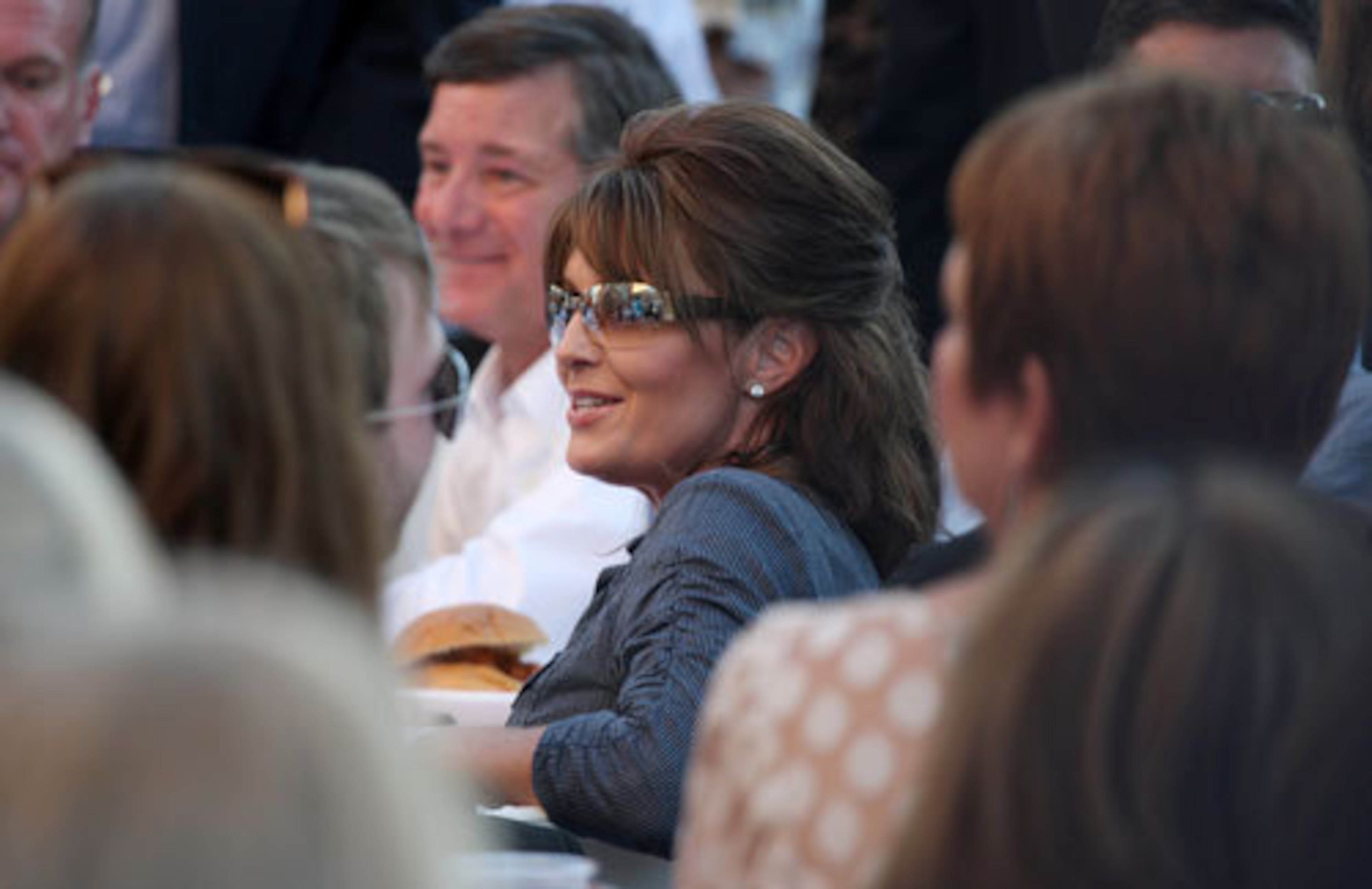 Sarah Palin greets supporters as they gather for a barbecue with the former Alaska governor.