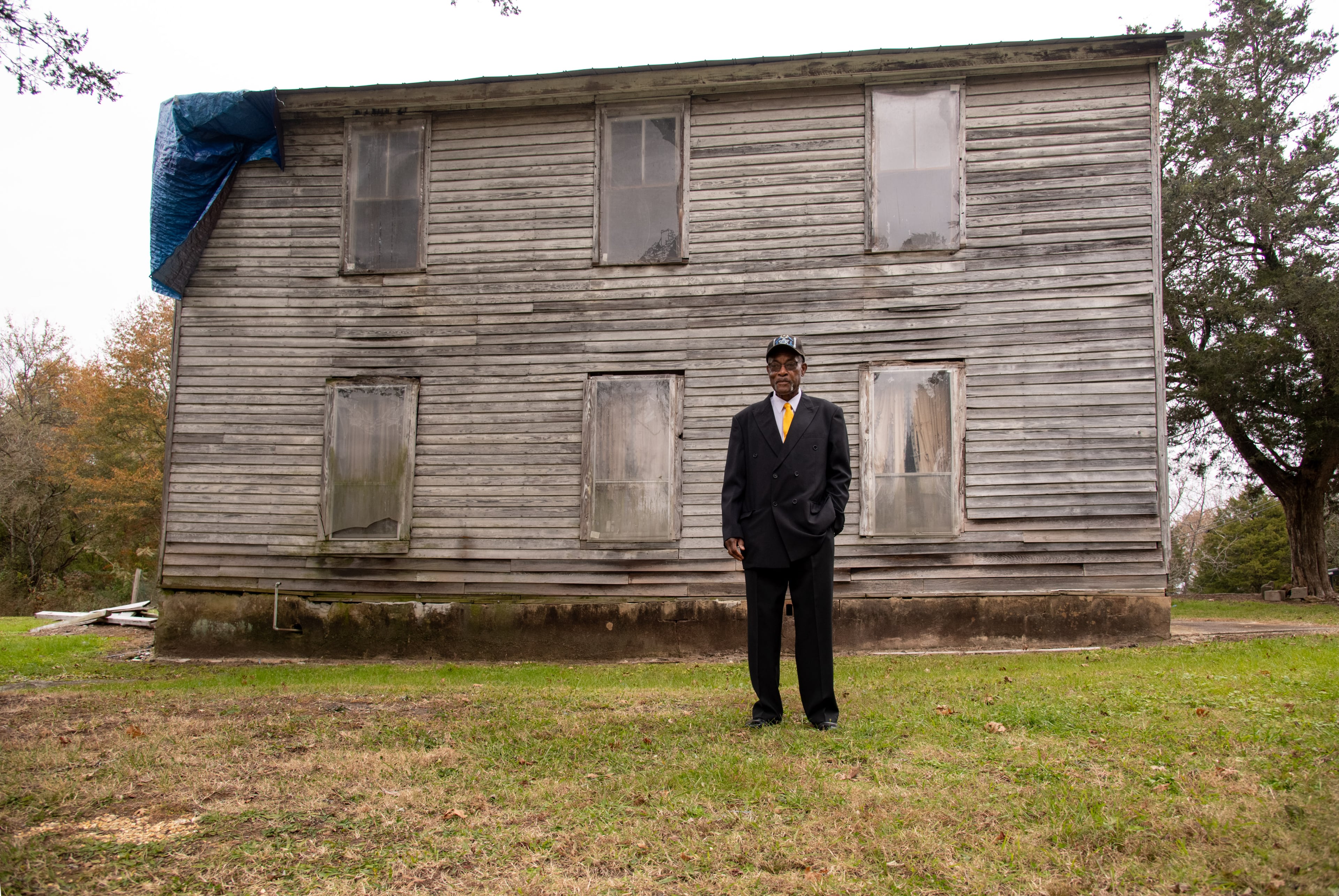 Myers stands outside the Chickamauga Masonic Lodge, which community members hope will become active again once the building is repaired. Contributed by Mark Gilliland