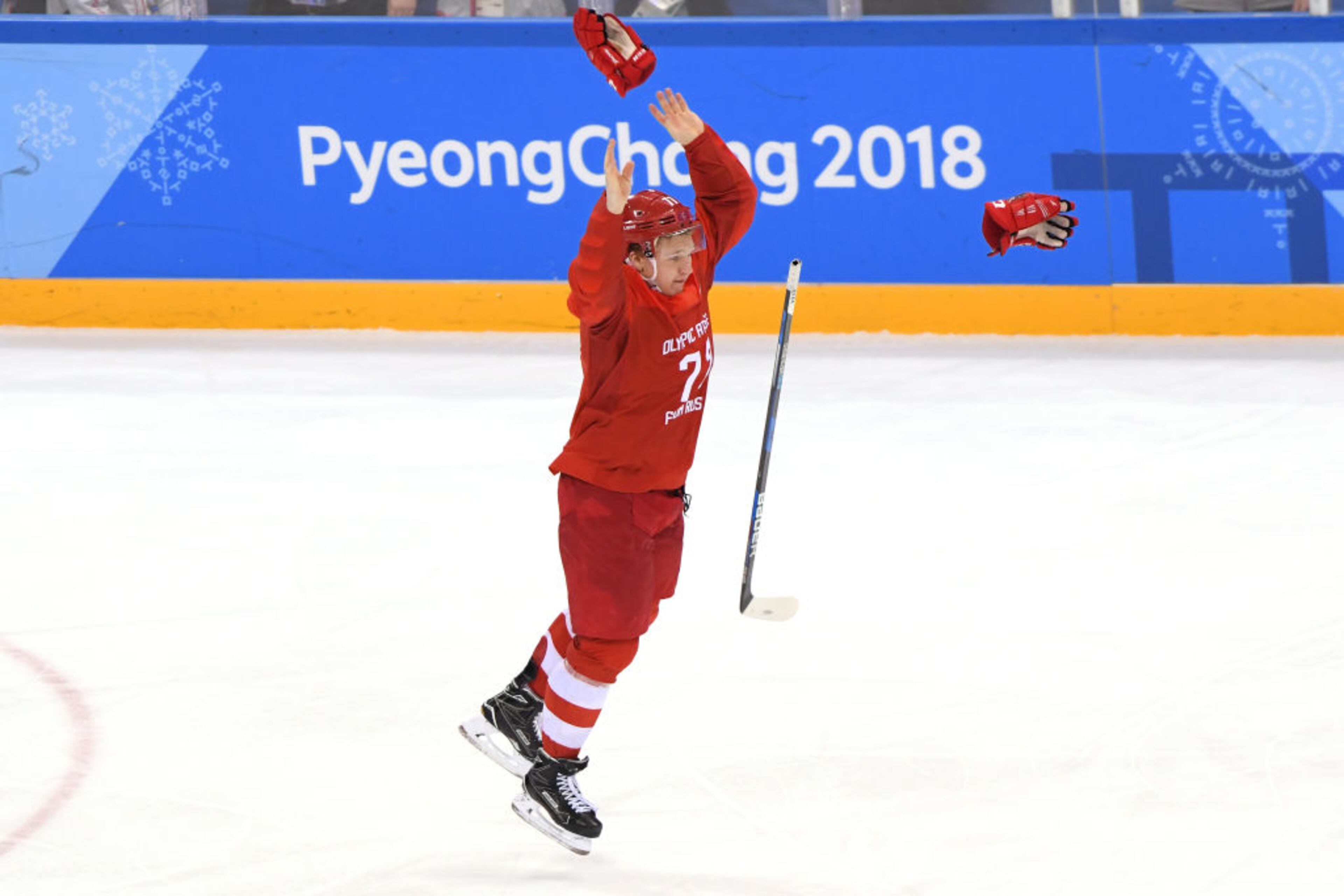 GANGNEUNG, SOUTH KOREA - FEBRUARY 25: Gold medal winner Kirill Kaprizov #77 of Olympic Athlete from Russia celebrates after scoring a goal in overtime to defeat Germany 4-3 during the Men's Gold Medal Game on day sixteen of the PyeongChang 2018 Winter Olympic Games at Gangneung Hockey Centre on February 25, 2018 in Gangneung, South Korea. (Photo by Harry How/Getty Images)