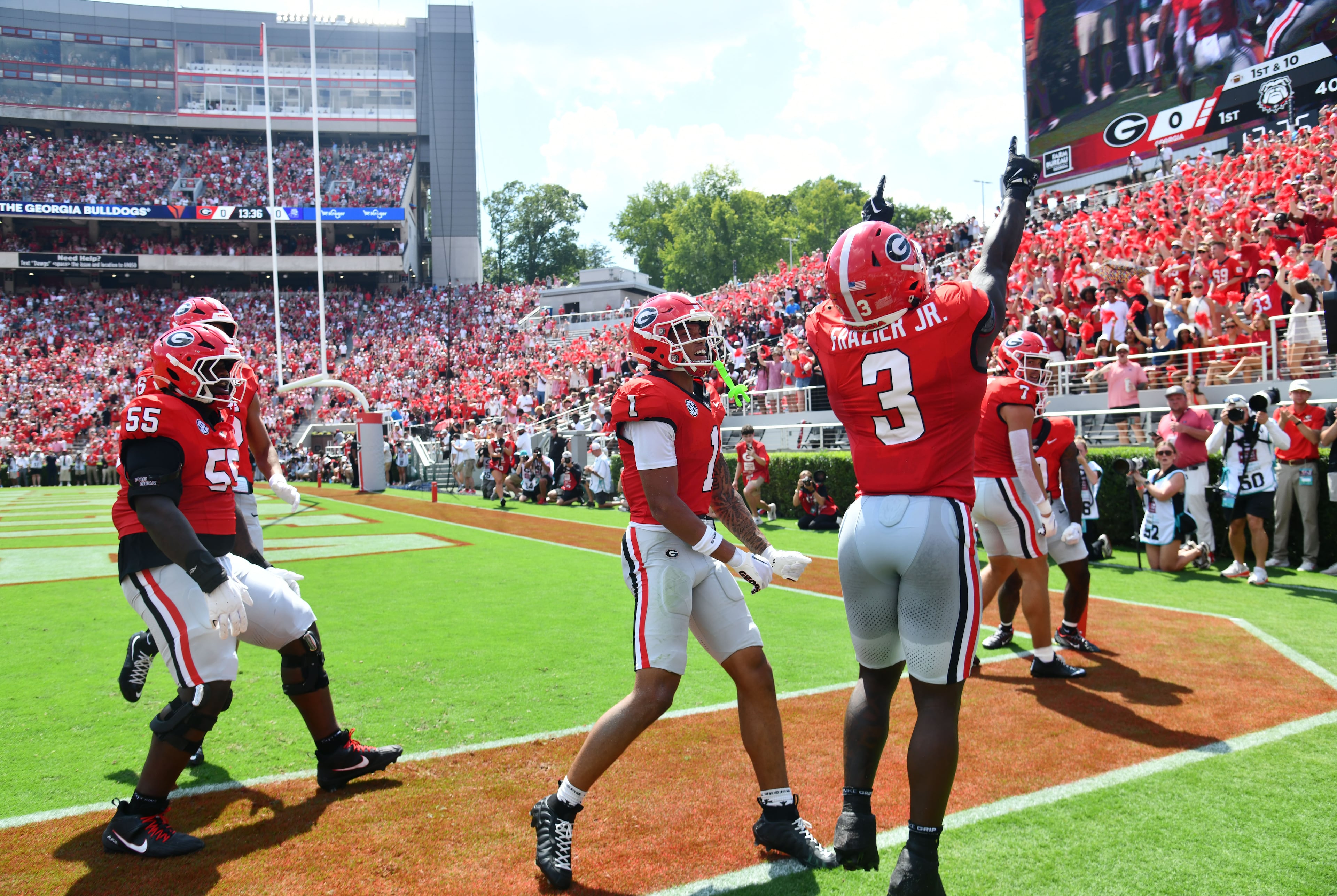 Georgia running back Nate Frazier celebrates after scoring a touchdown during the first half of an NCAA football game against Tennessee State at Sanford Stadium on Saturday, Sept. 5, 2026, in Athens, Ga. (Hyosub Shin/AJC)