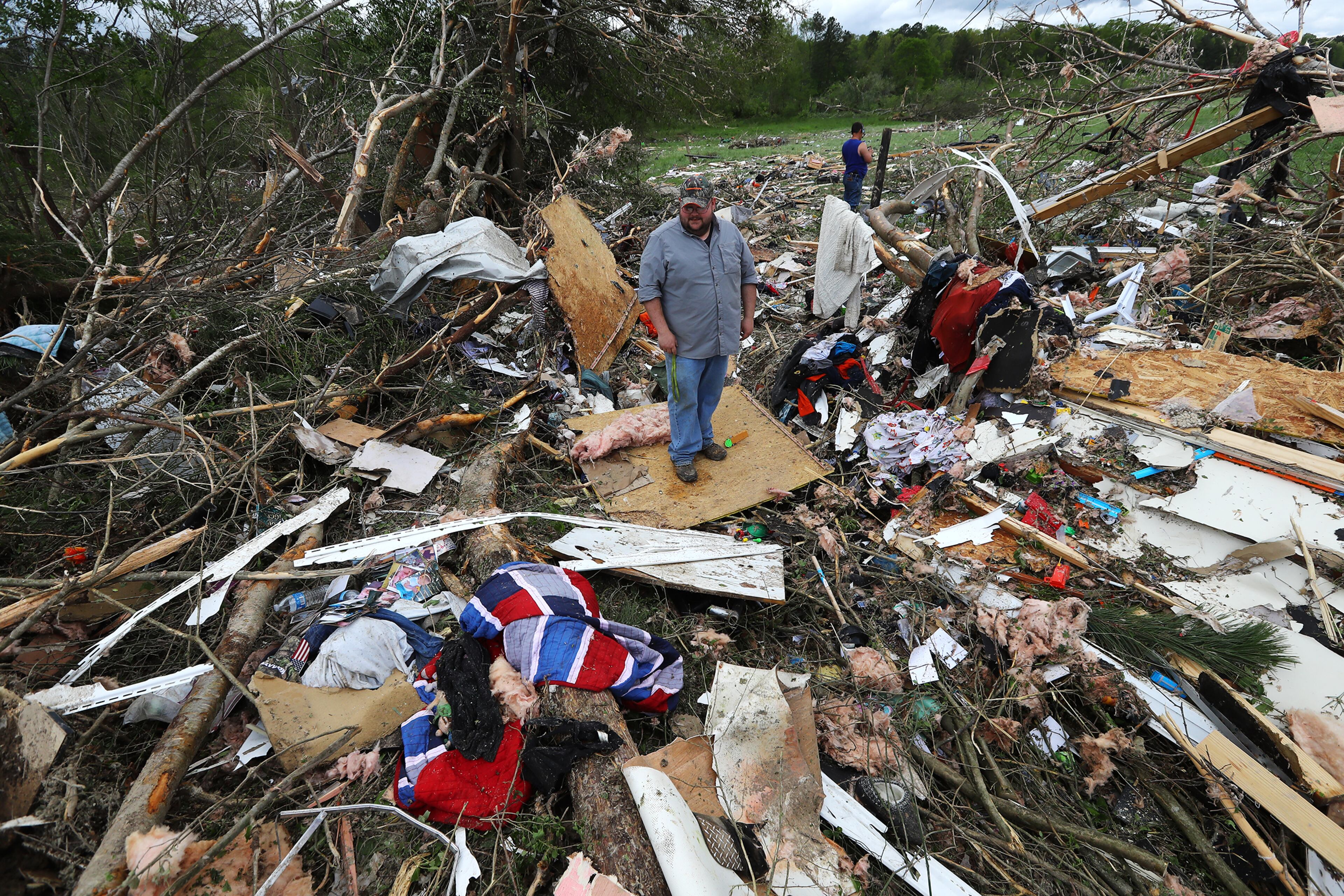 April 13, 2020 Chatsworth: Justin Tallent salvages what he can from the remains of his cousinâs trailer in the Deer Park trailer park where a deadly tornado killed at least 7 in Murray County on Monday, April 12, 2020, in Chatsworth. Curtis Compton ccompton@ajc.com