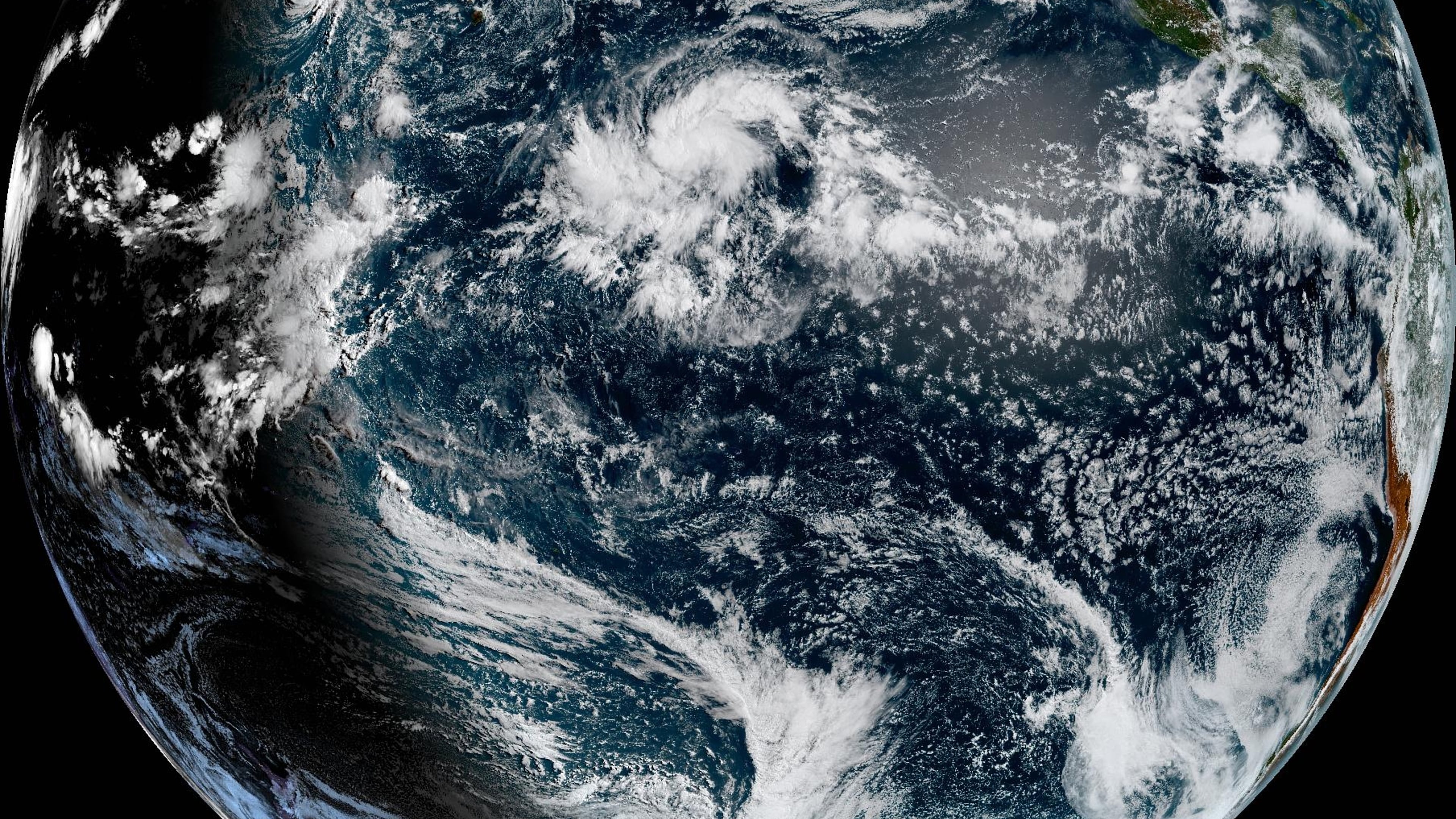 This satellite image provided by NOAA shows Hurricane Lala on Wednesday, Aug. 19, 2026, in the Pacific Ocean northeast of Hawaii. (NOAA via AP)
