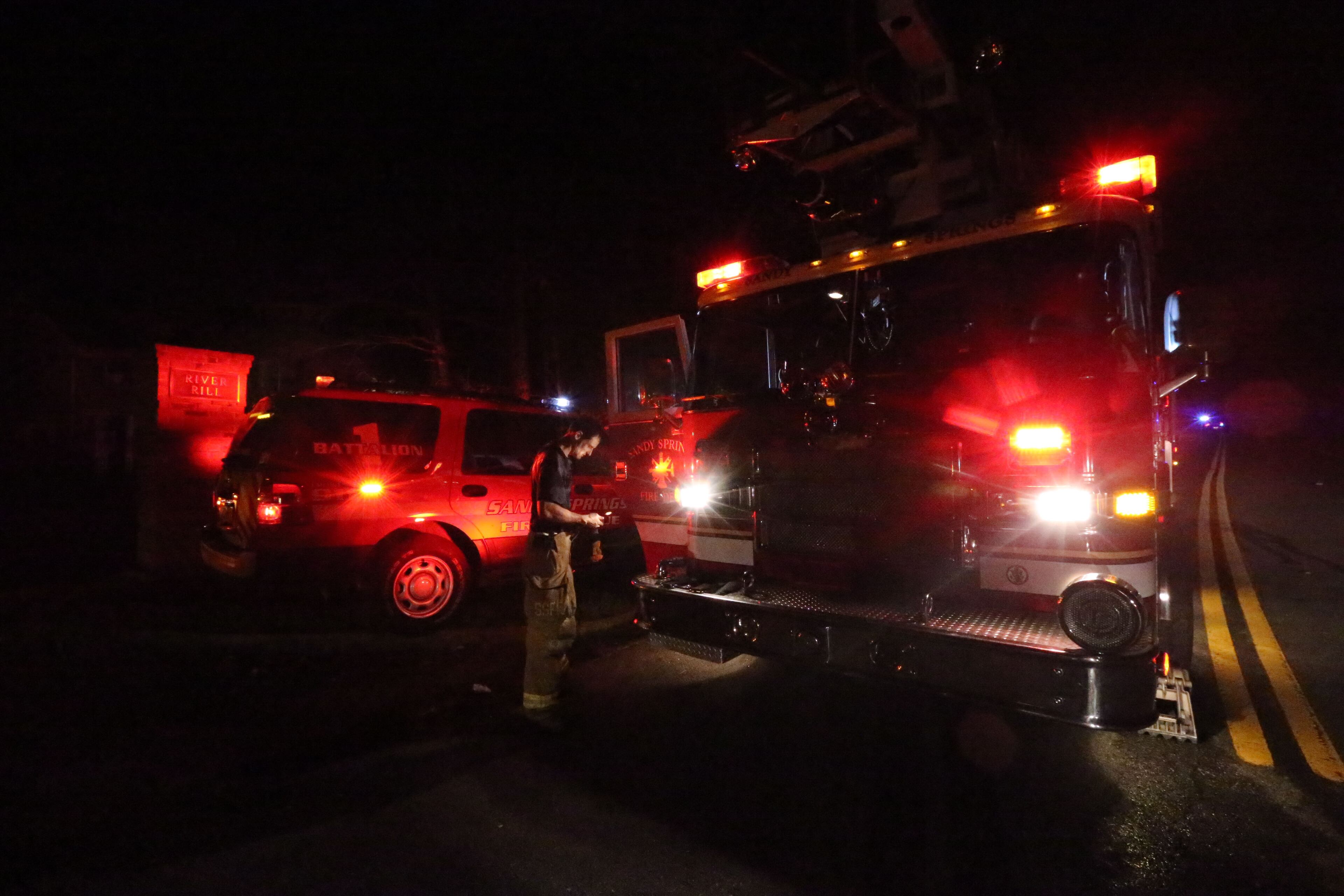 Two people died early Monday after being pulled from a burning home in Sandy Springs. The fire broke out around midnight in a duplex on North River Parkway. | JOHN SPINK/jspink@ajc.om