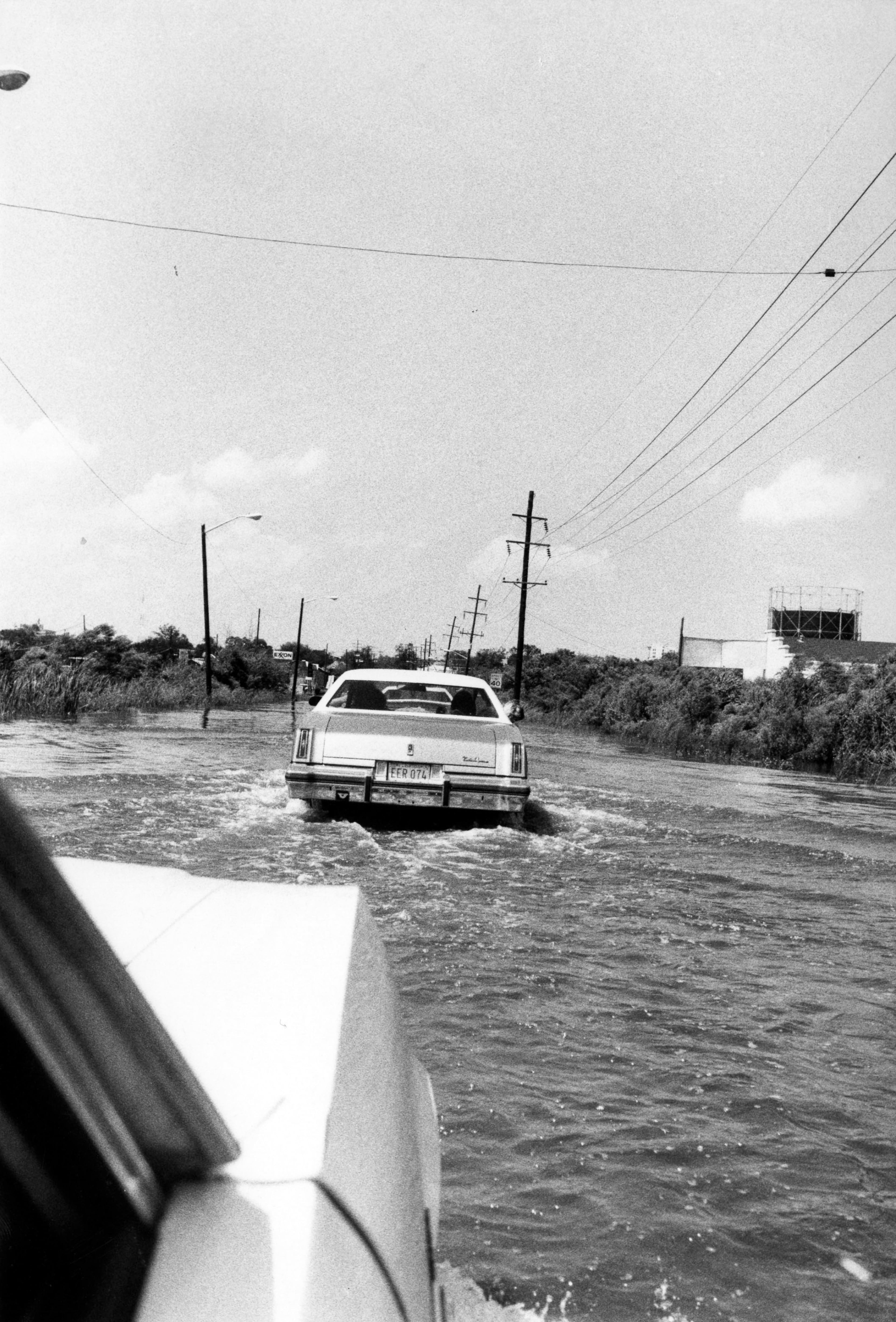 Title Flooded roadways in Savannah after Hurricane David, 1979
Identifier AJCP215-006a
Date of original 1979-09-06
Decade 1970s
Creator Atlanta Journal-Constitution
Contributors Downs, Billy (Photographer)
Description Printed on back: "Hurricane David. High water in Savannah, with car going thru it. Photo by Billy Downs." Caption: "Water over the road doesn't stop these Savannah motorists. September 6, 1979"
Subject Hurricane damage
Hurricanes
Floods
Subject (names) Hurricane David (1979)
Location depicted Savannah (Ga.)
Chatham County (Ga.)
Collection Atlanta Journal-Constitution Photographic Archive
Curatorial area Photographic Collections
Digital publisher Georgia State University Library
Rights information Copyright to items in this collection is owned by the Atlanta Journal-Constitution. Items may be used for scholarship, educational, and personal use. Additional uses will require permission of the rights holder.
Citation AJCP215-006a, Atlanta Journal-Constitution Photographic Archives. Special Collections and Archives, Georgia State University Library.
Source format black-and-white photographs
Format image/jp2
Type Image
