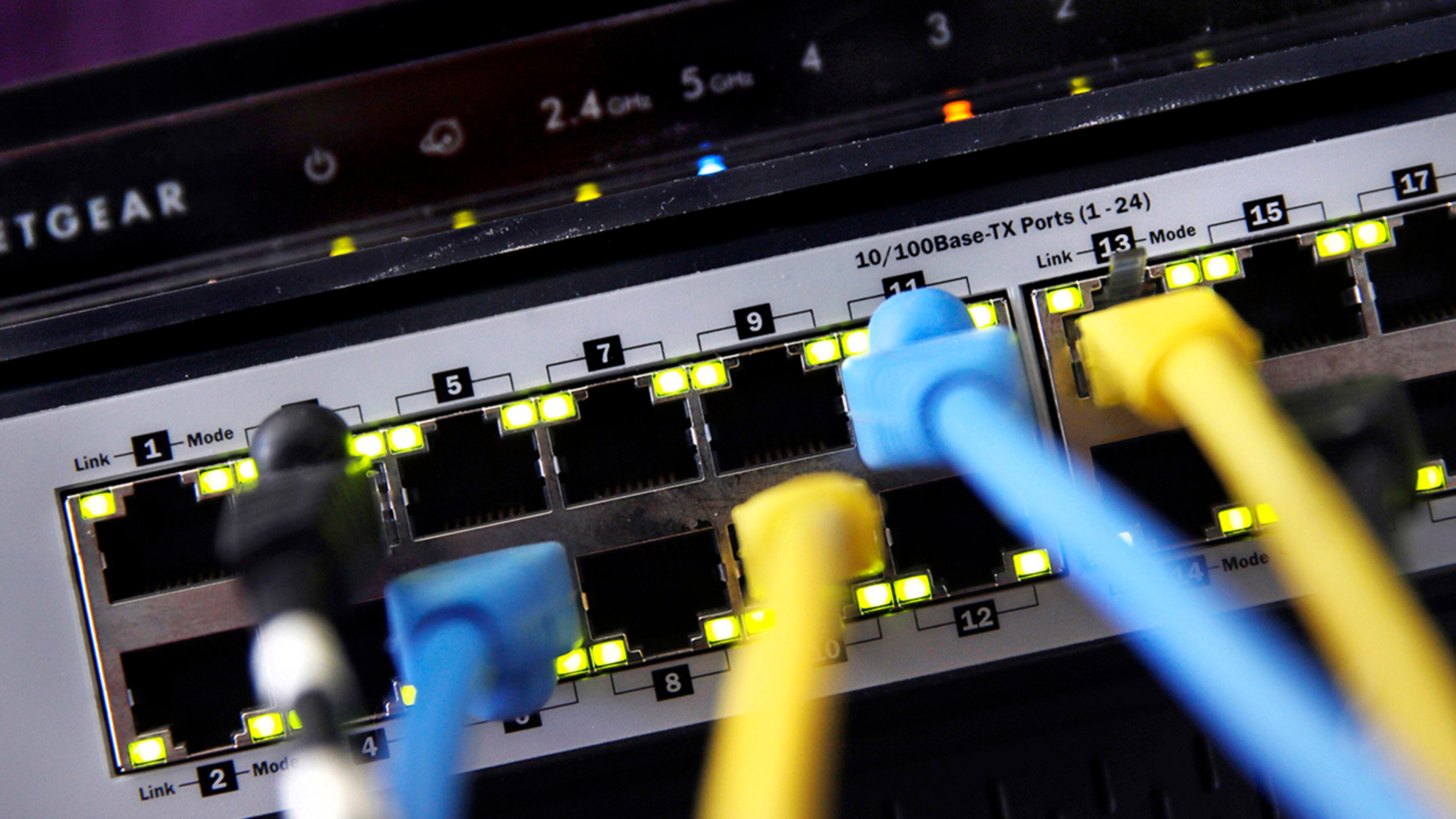 In this June 19, 2018, file photo a router and internet switch are displayed in East Derry, N.H. (AP Photo/Charles Krupa, File)