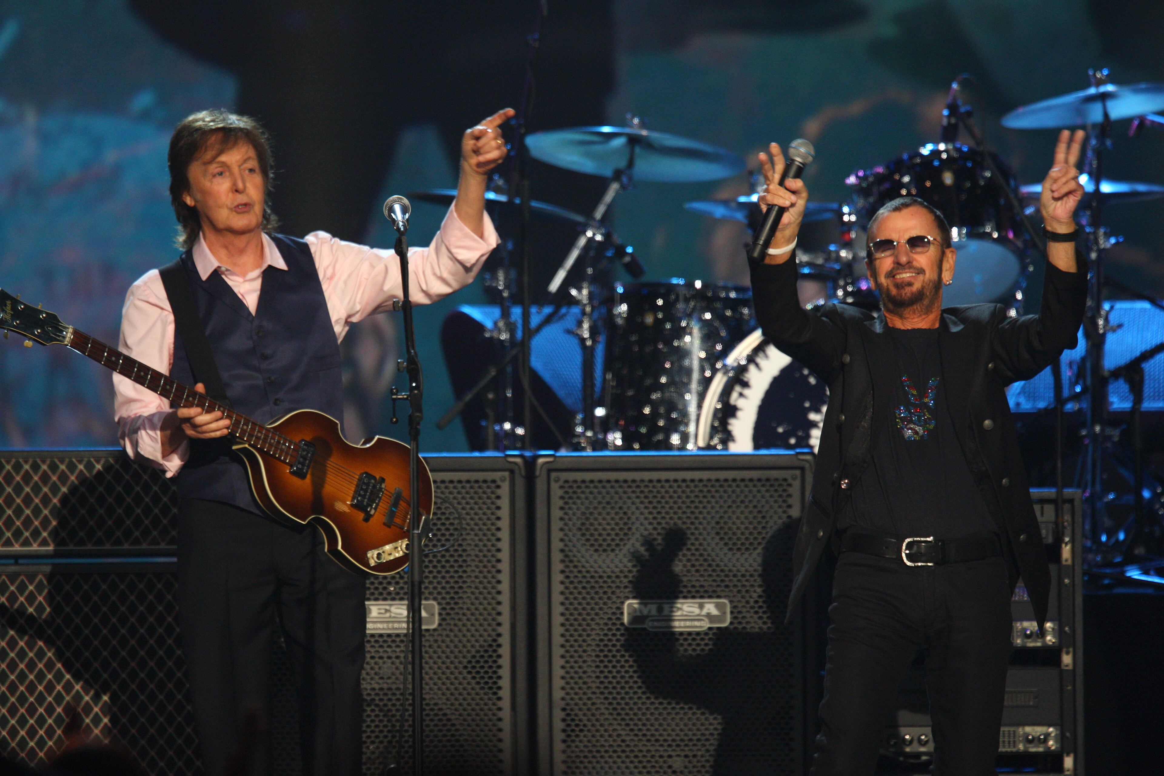 Paul McCartney and Ringo Starr perform at The Night that Changed America: A Grammy Salute to the Beatles, on Monday, Jan. 27, 2014, in Los Angeles. (Photo by Zach Cordner/Invision/AP)