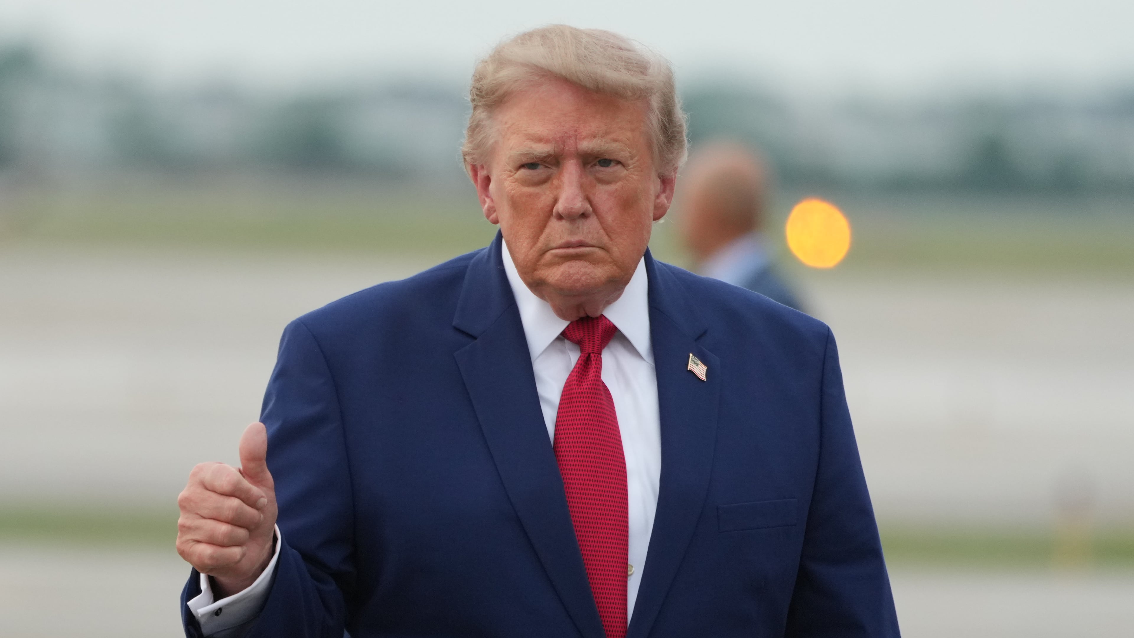 President Donald Trump walks from Marine One to board Air Force One at Cleveland Hopkins International Airport in Cleveland, Tuesday, Aug. 11, 2026. (AP Photo/Mark Schiefelbein)
