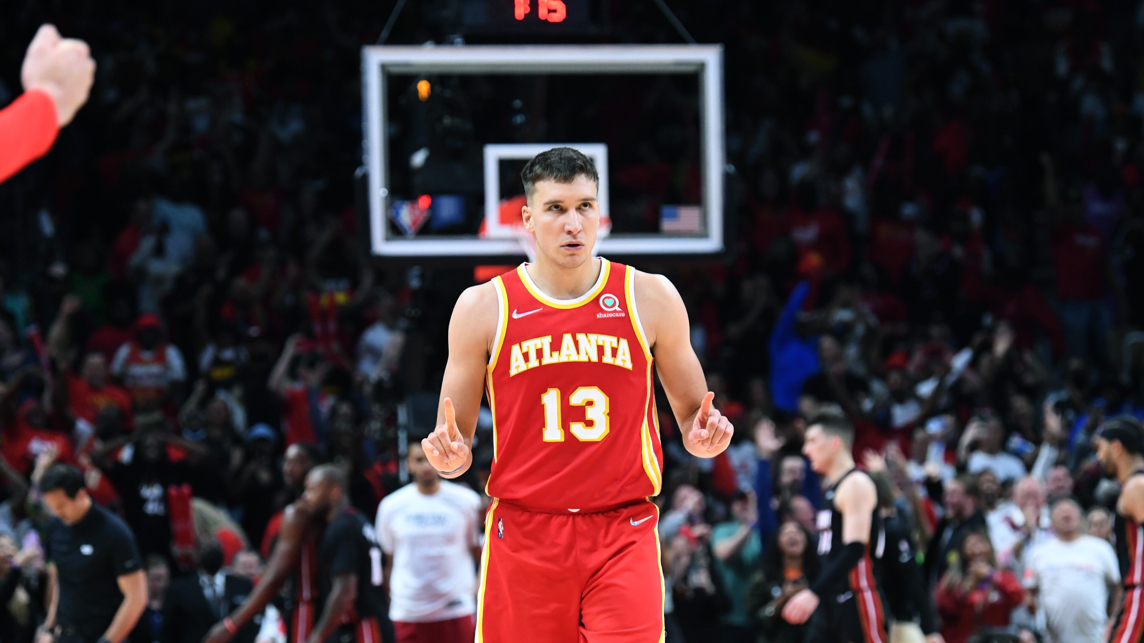 Hawks guard Bogdan Bogdanovic (13) reacts at the end of the fourth quarter in Game 3 of the first round of the NBA playoffs at State Farm Arena on Friday, April 22, 2022. (Hyosub Shin / Hyosub.Shin@ajc.com)