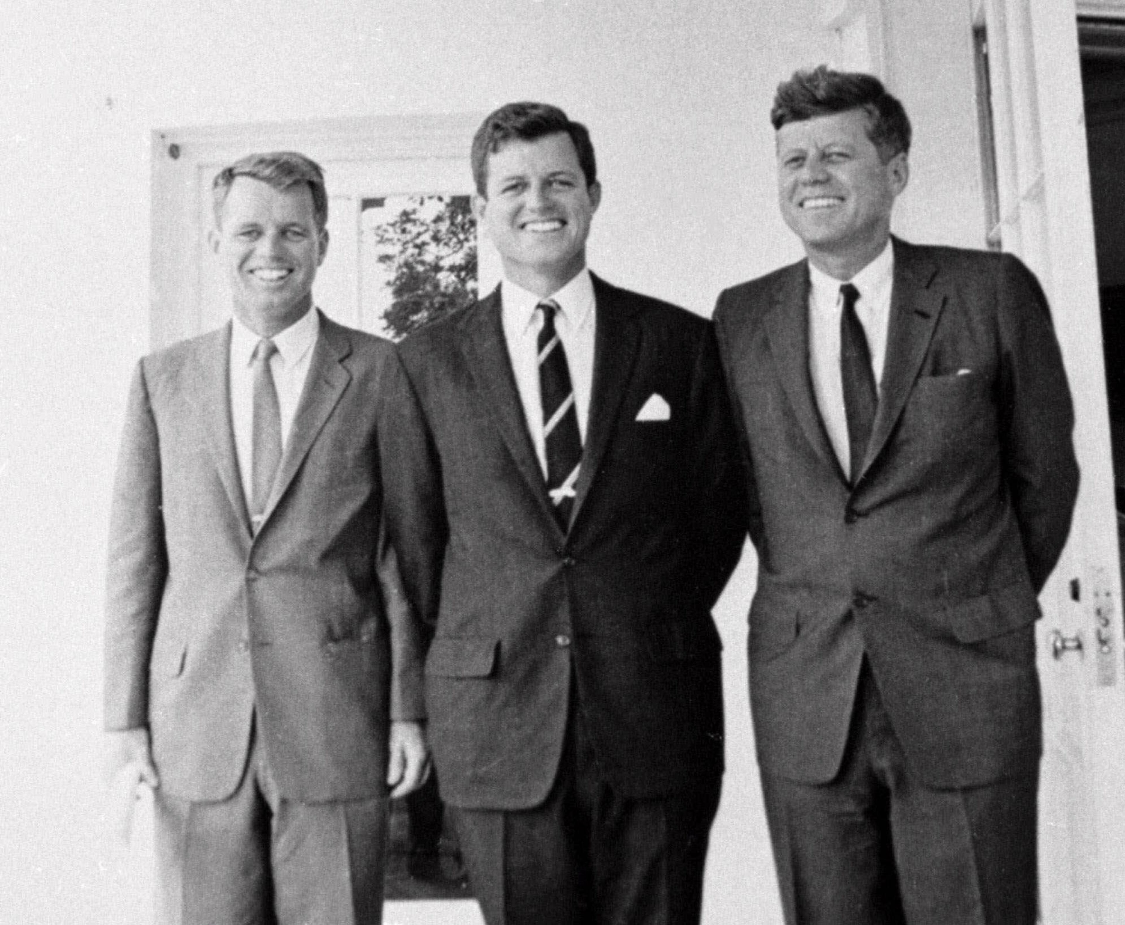 Three brothers: Sen. Edward M. Kennedy, D-Mass., center, poses with his brothers U. S. Attorney General Robert F. Kennedy, left, and President John F. Kennedy at the White House in Washington. (AP Photo)