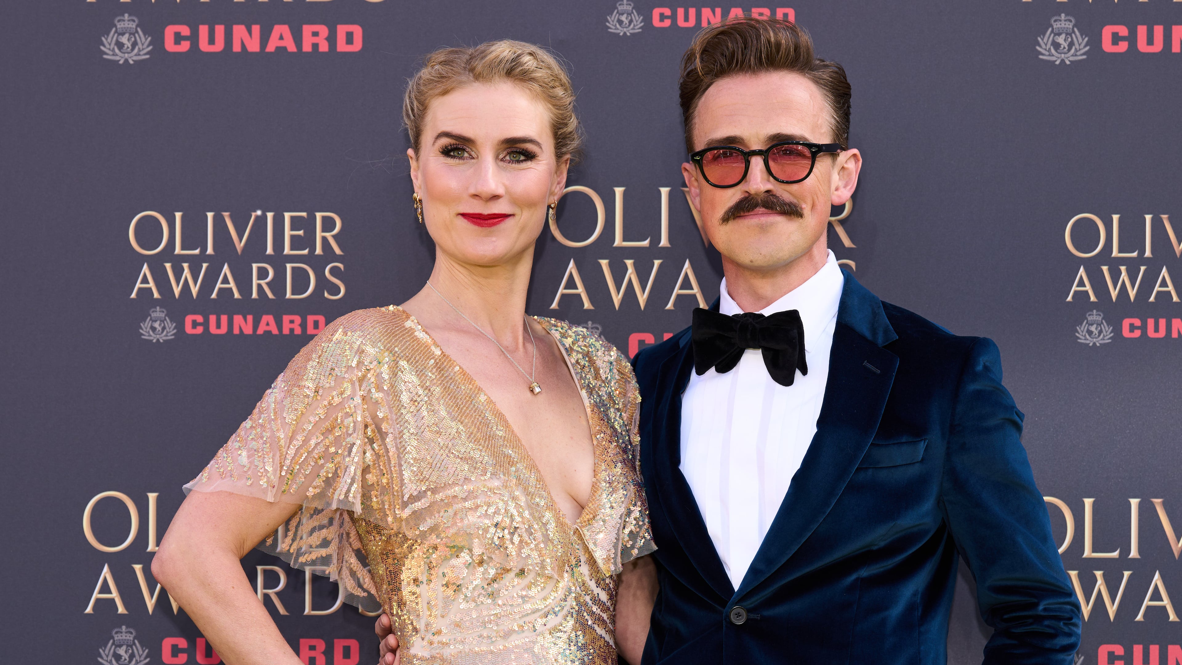FILE - Jessica Swale, left, and Tom Fletcher appear at the Olivier Awards in London on April 12, 2026. (Photo by Scott A Garfitt/Invision/AP, File)