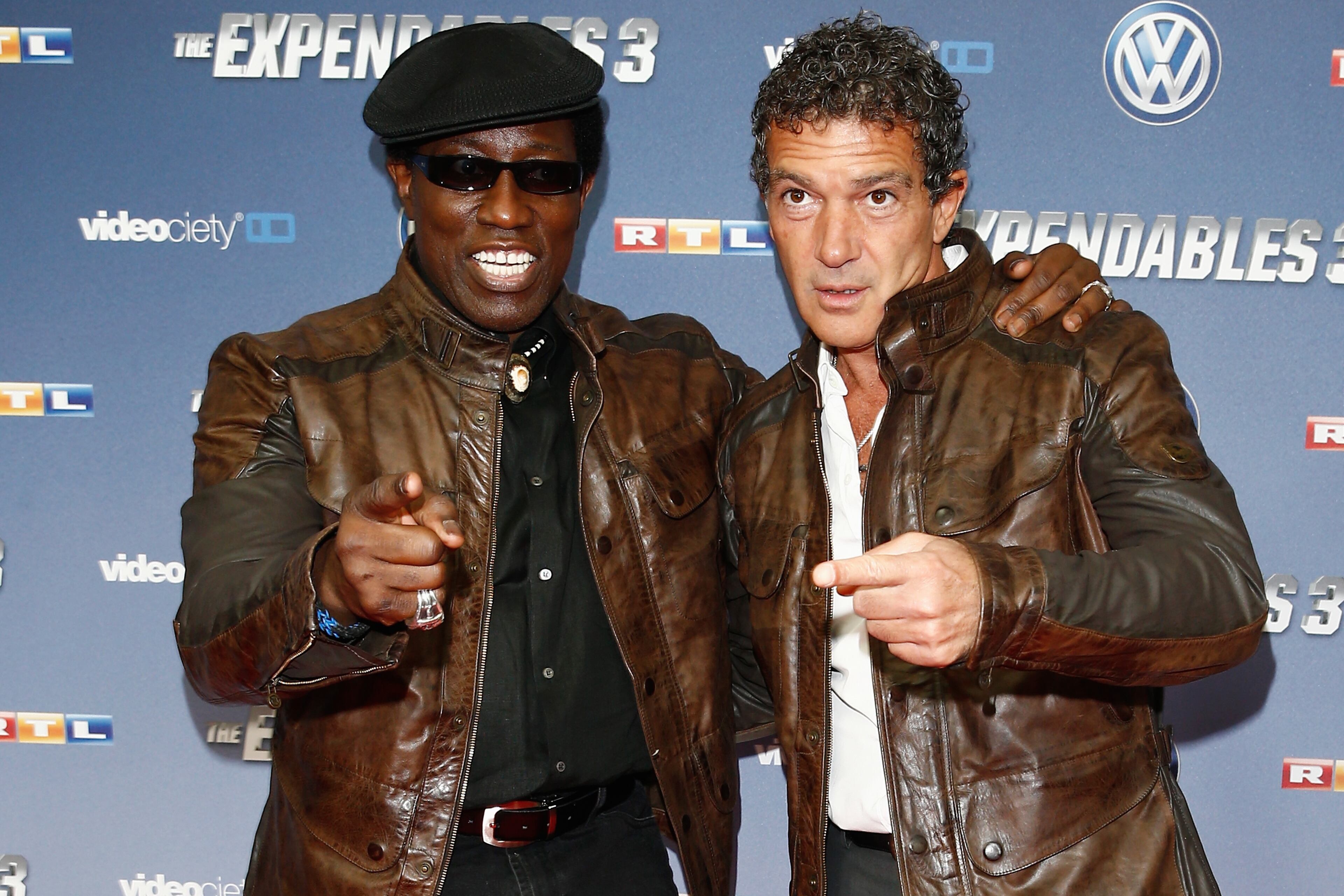 COLOGNE, GERMANY - AUGUST 06: (L-R) Wesley Snipes and Antonio Banderas attend the German premiere of the film 'The Expendables 3' at Residenz Kino on August 6, 2014 in Cologne, Germany. (Photo by Andreas Rentz/Getty Images)