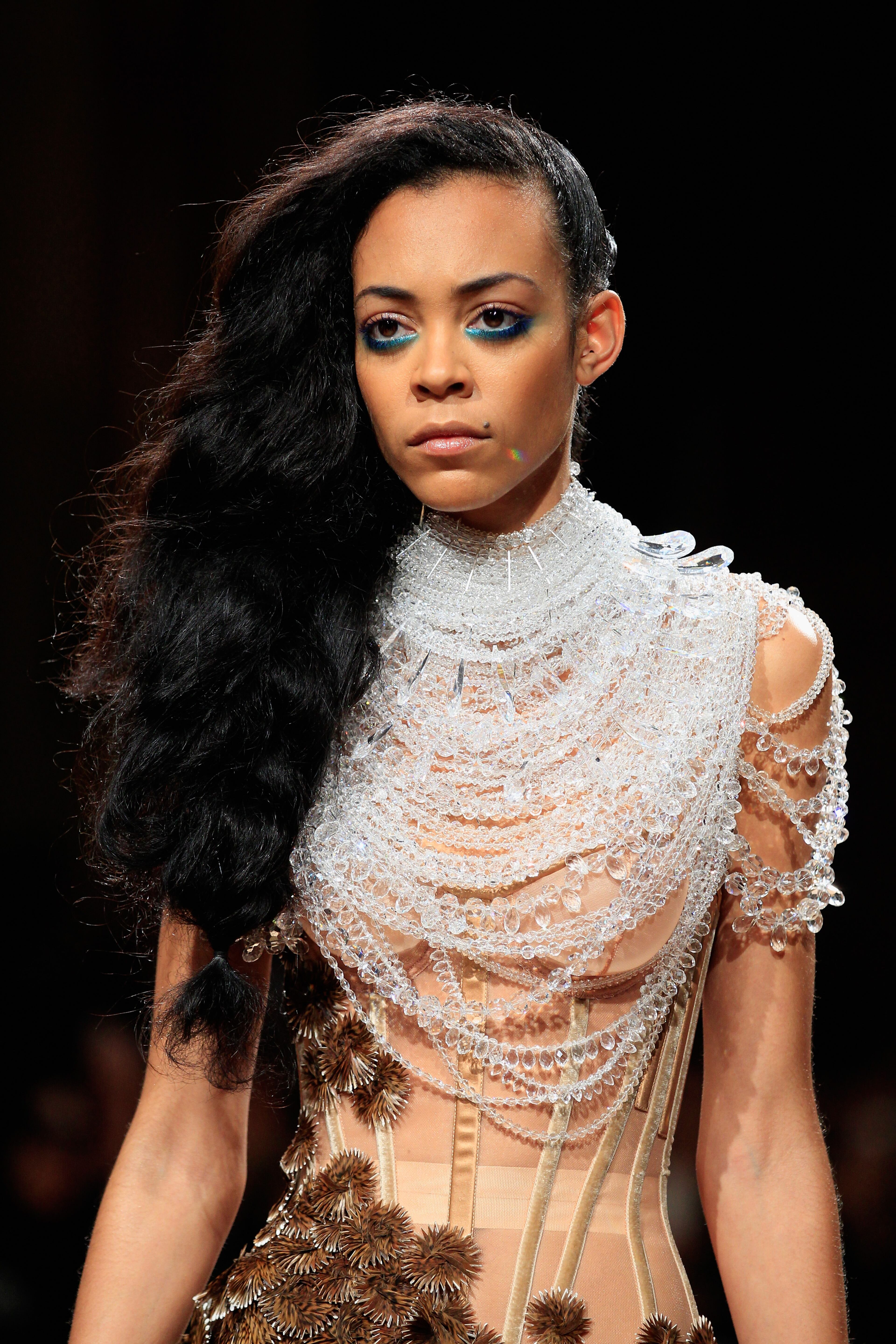 PARIS, FRANCE - JULY 10: A model walks the runway during the Serkan Cura show as part of Paris Fashion Week - Haute Couture Fall/Winter 2014-2015 at Mairie du 4e on July 10, 2014 in Paris, France. (Photo by Thierry Chesnot/Getty Images)