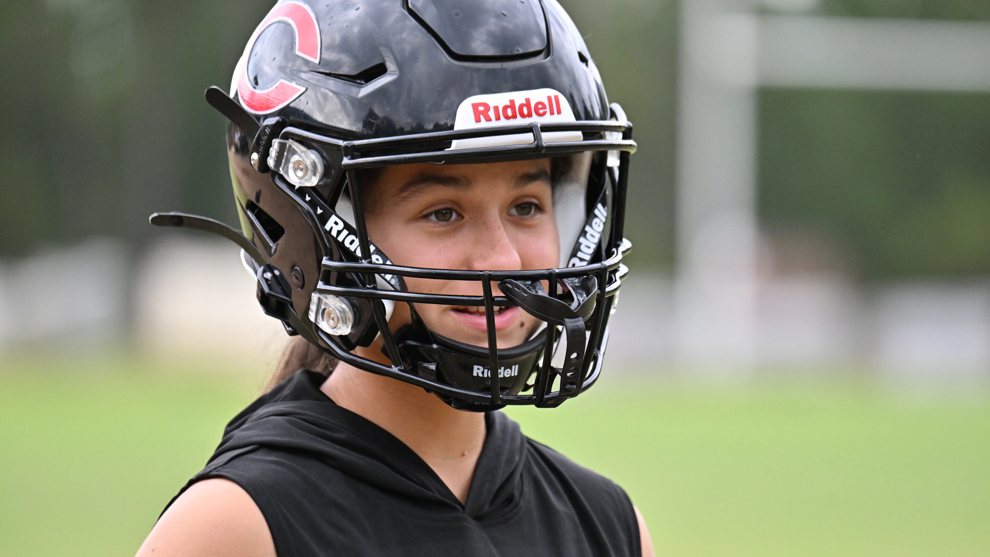 Freshman Mia Flores (pictured) credits soccer teammate Monroe Wiggins — the daughter of Callaway football coach Pete Wiggins — and soccer coach Brooke Jackson with urging her to try out for the varsity football team. (Hyosub Shin/AJC)