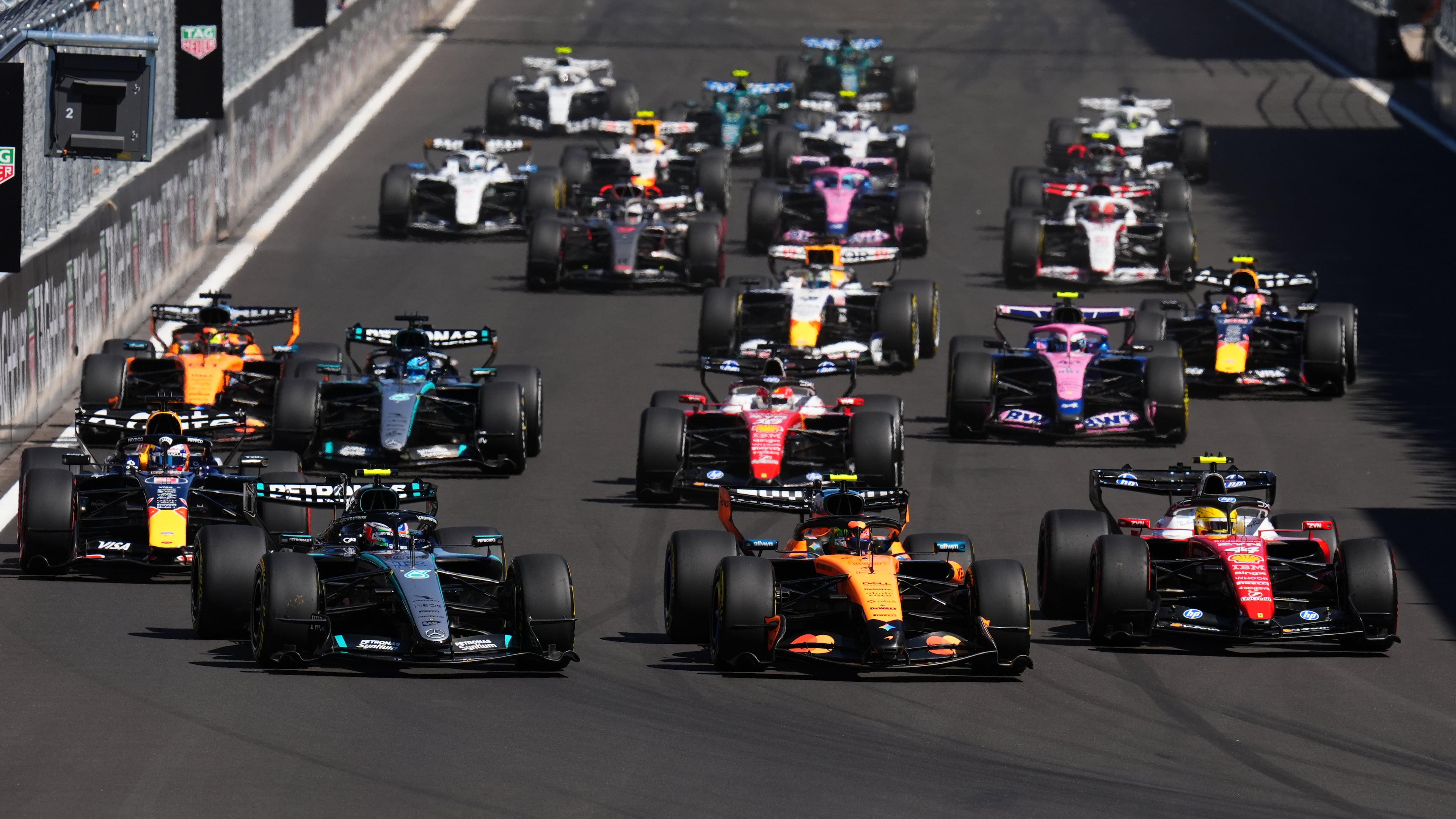 McLaren driver Lando Norris of Britain, center, leads the field after the start of the Spanish Formula One Grand Prix race in Madrid, Sunday, Sept. 13, 2026. (AP Photo/Manu Fernandez)
