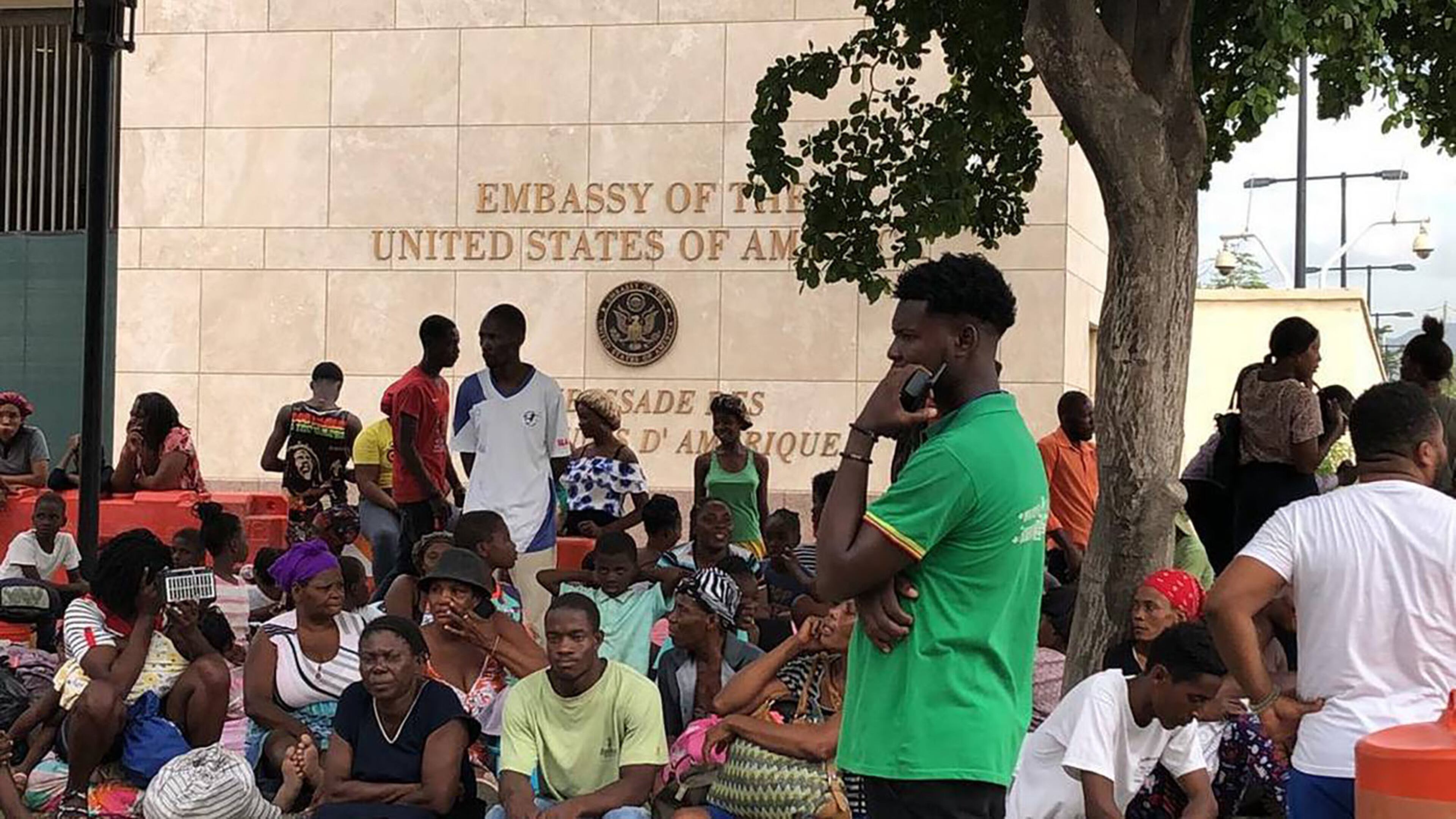 In July 2023, scores of Haitians living in the Clercine neighborhood near the U.S. Embassy in Port-au-Prince sought refuge from escalating gang violence by camping out in the courtyard of the facility. (Johnny Fils-Aime/Miami Herald/TNS)