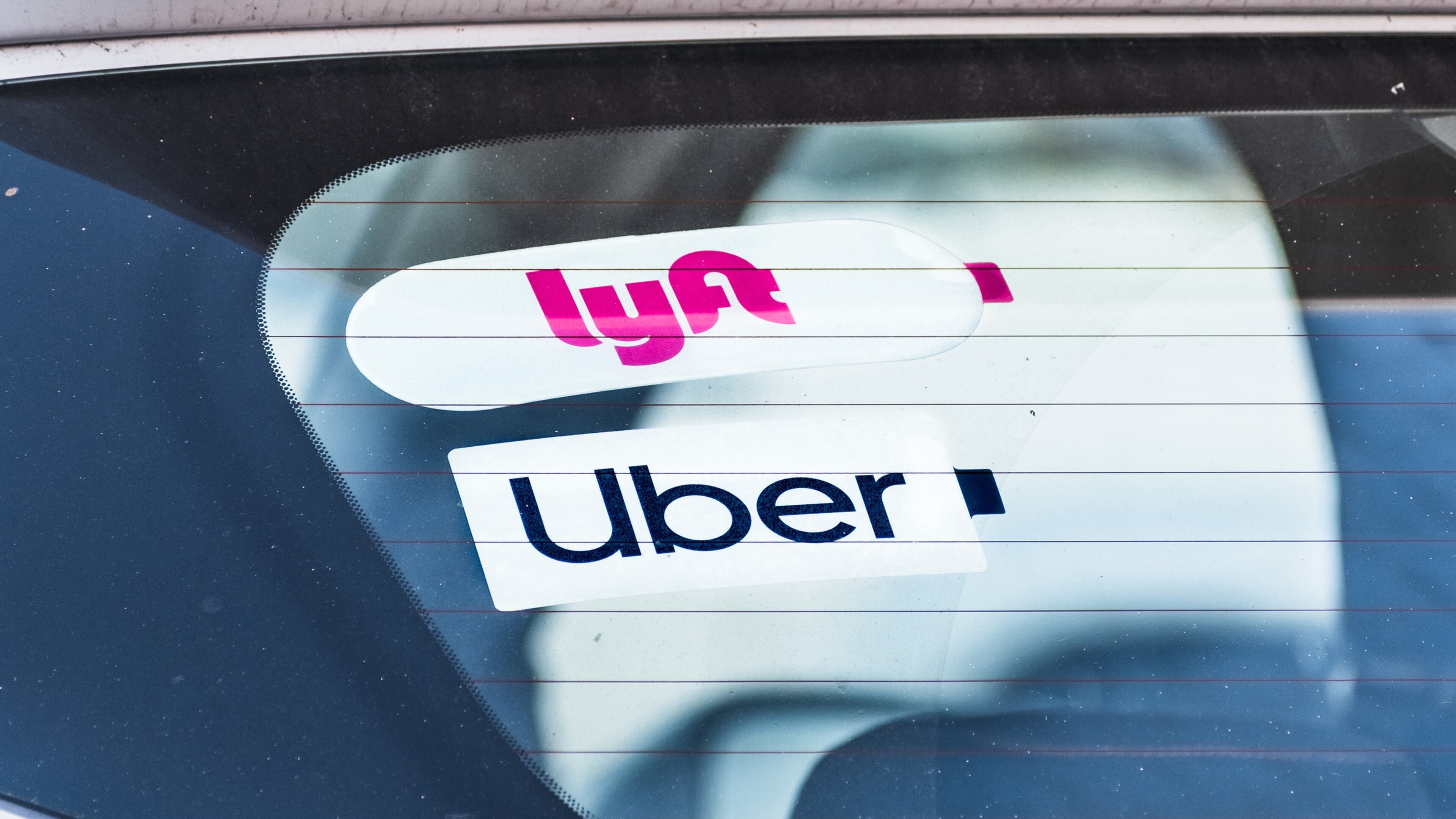 Uber Technologies Inc. has begun locking New York City drivers out of its app during periods of low demand in an attempt to fight a minimum wage rule, and Lyft Inc. is threatening to do the same. (Dreamstime/TNS)