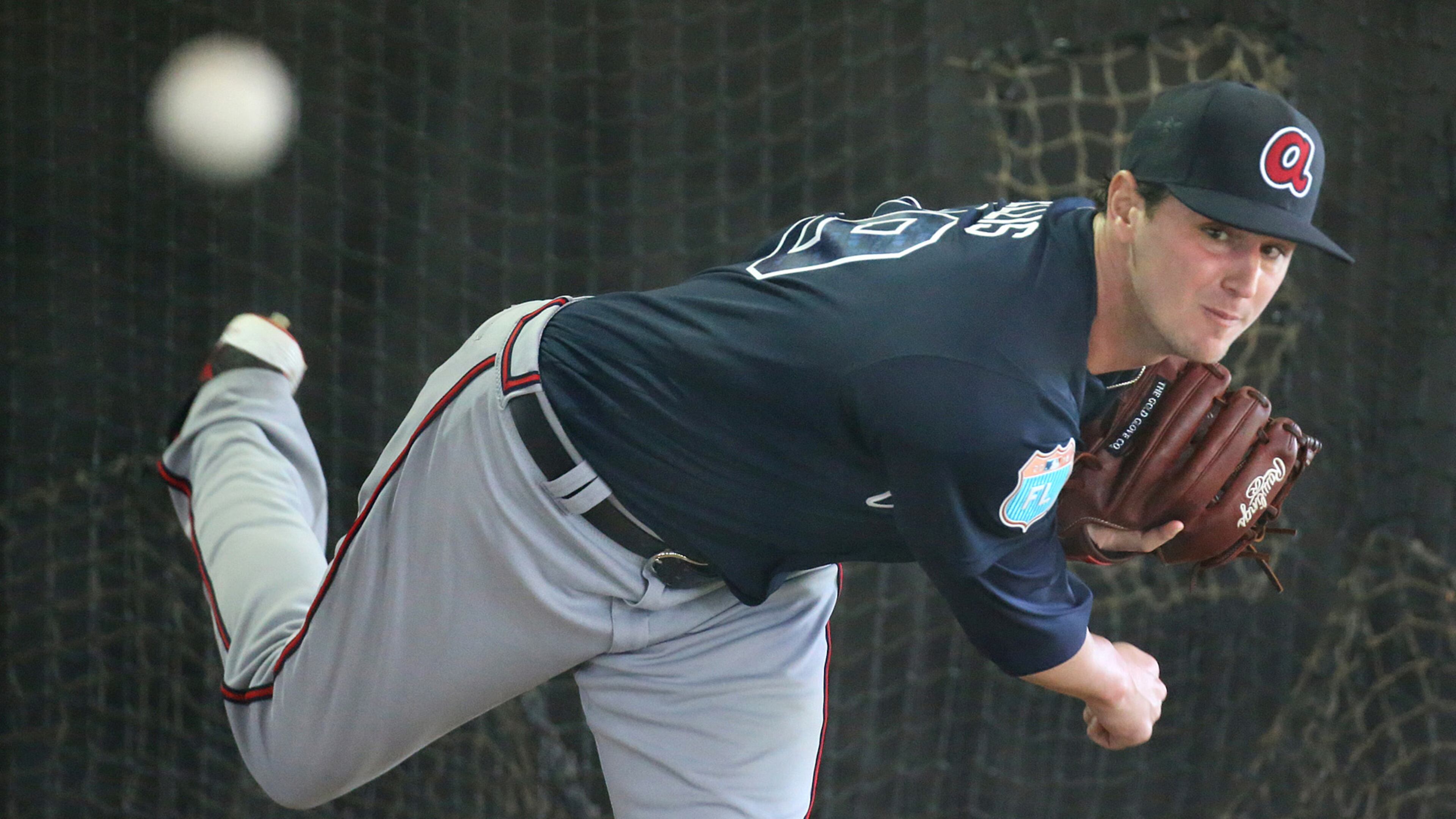 022416 LAKE BUENA VISTA: Braves pitcher Chris Ellis delivers a pitch in the batting cages at Champion Stadium on Wednesday, Feb 24, 2016, at the ESPN Wide World of Sports, Lake Buena Vista, FL. Curtis Compton / ccompton@ajc.com