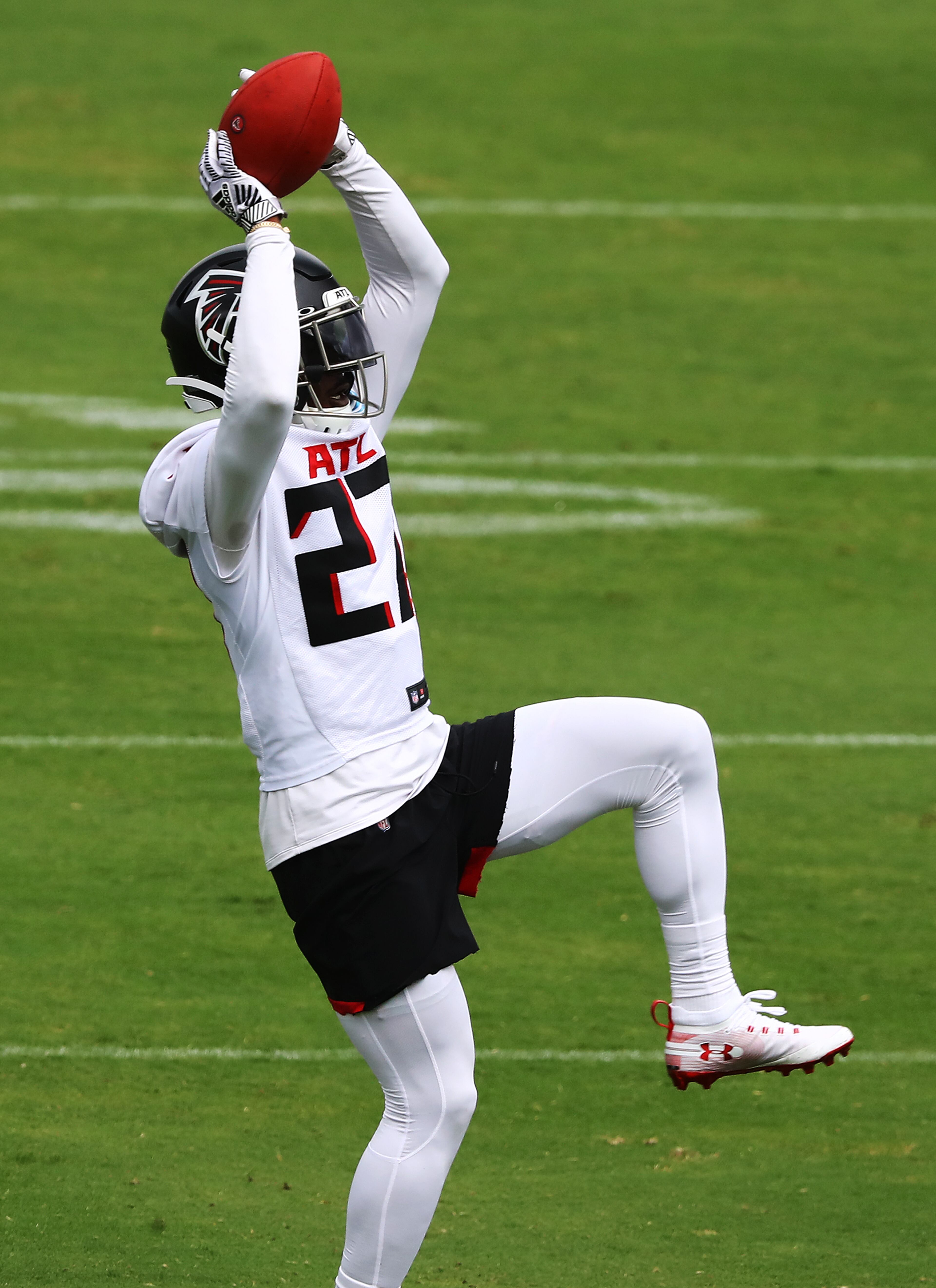 Falcons safety Damontae Kazee goes up for the pass interception during training camp on Saturday, August 15, 2020 in Flowery Branch. Curtis Compton ccompton@ajc.com