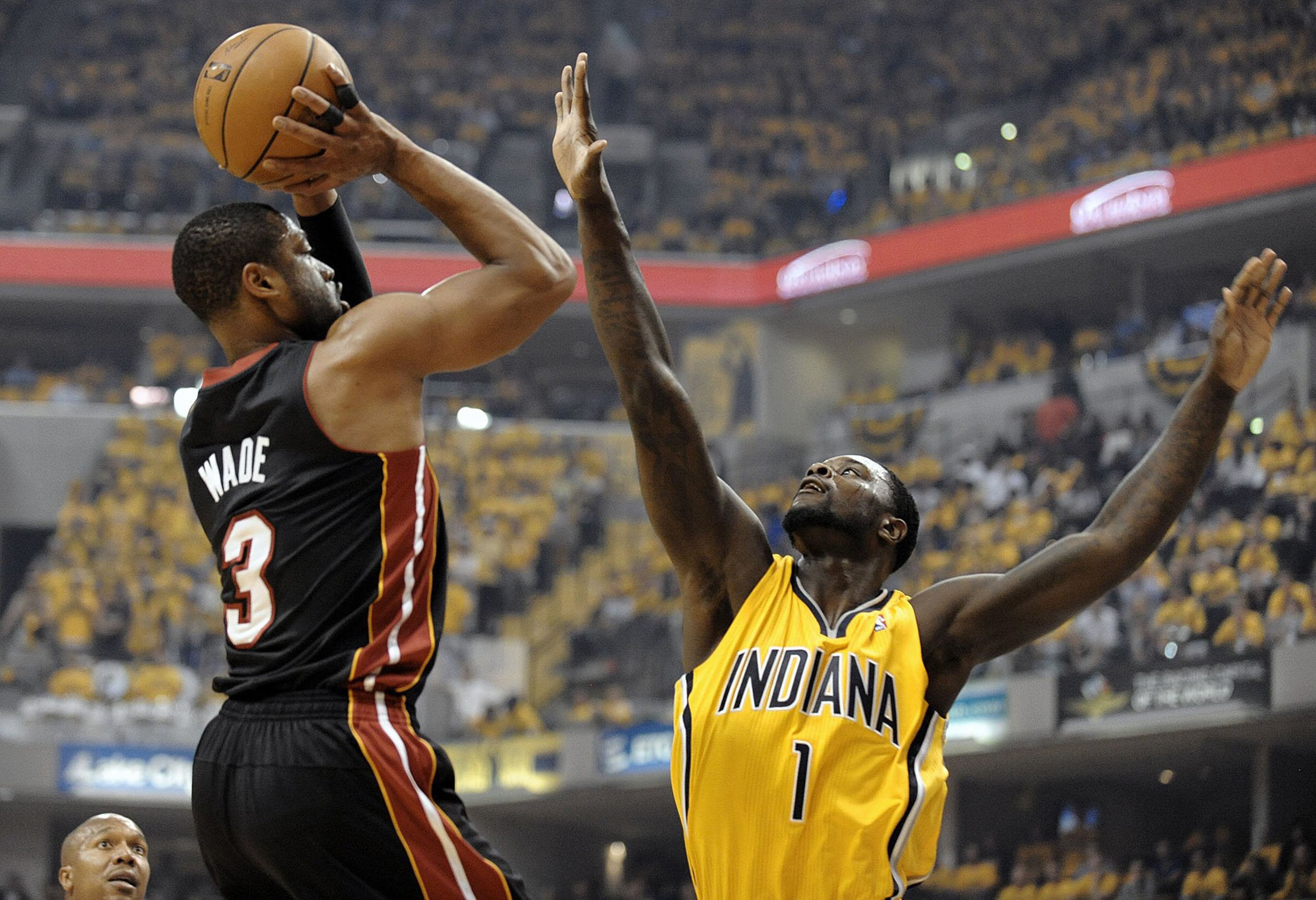 Before the NBA’s Eastern Conference finals began between the Pacers and the Heat, Lance Stephenson (right) of the Pacers indicated that one strategy for stopping Heat star Dwyane Wade was putting strain on Wade’s knees. He told the Palm Beach Post, “D. Wade — I think his knee is messed up, so I’ve got to be extra aggressive and make him run and have him running around and make his knee flare up or something,” he said after the Pacers practiced this afternoon. “I’ll do anything as much as possible.” In two games, Wade has scored 50 points and made 22 of 34 field goals, and he is still healthy. He scored 10 fourth-quarter points in the Heat’s important Game 2 victory. (Michael Laughlin/Sun Sentinel/MCT)