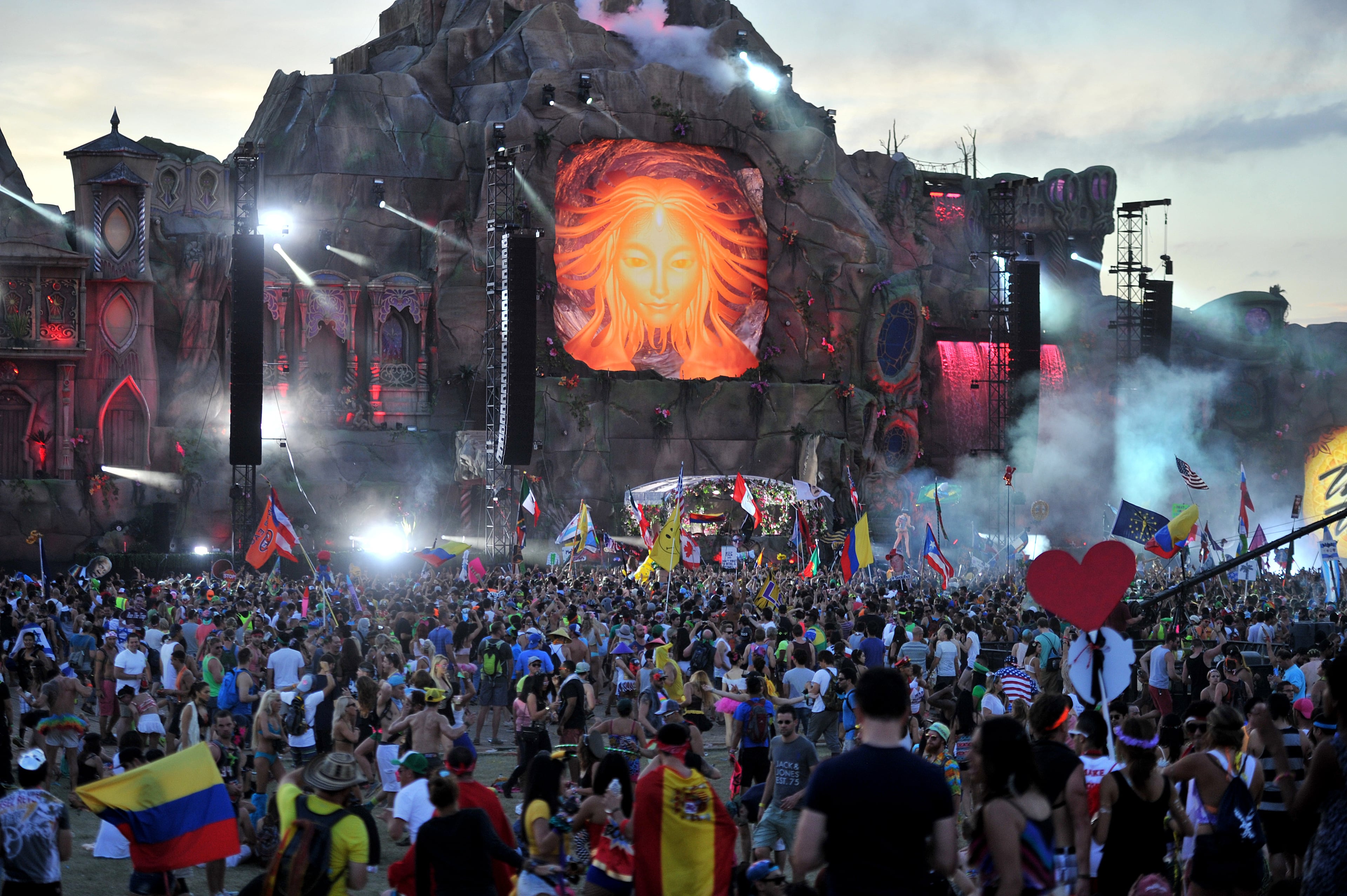 A crowd dances to DJ Carnage at the TomorrowWorld electronic music festival in Chattahoochee Hills, South of Atlanta, on Saturday, September 27, 2014. The event has been the world's most popular electronic music festival in Europe for years. It takes about three weeks to transform the 350-acres of farm land at Bouckaert Farm in Chattahoochee Hills into the self-contained EDM haven known as TomorrowWorld.The three-day fest officially kicked off at noon Friday and the pulsing bass won't cease until the early hours of Monday morning. HYOSUB SHIN / HSHIN@AJC.COM