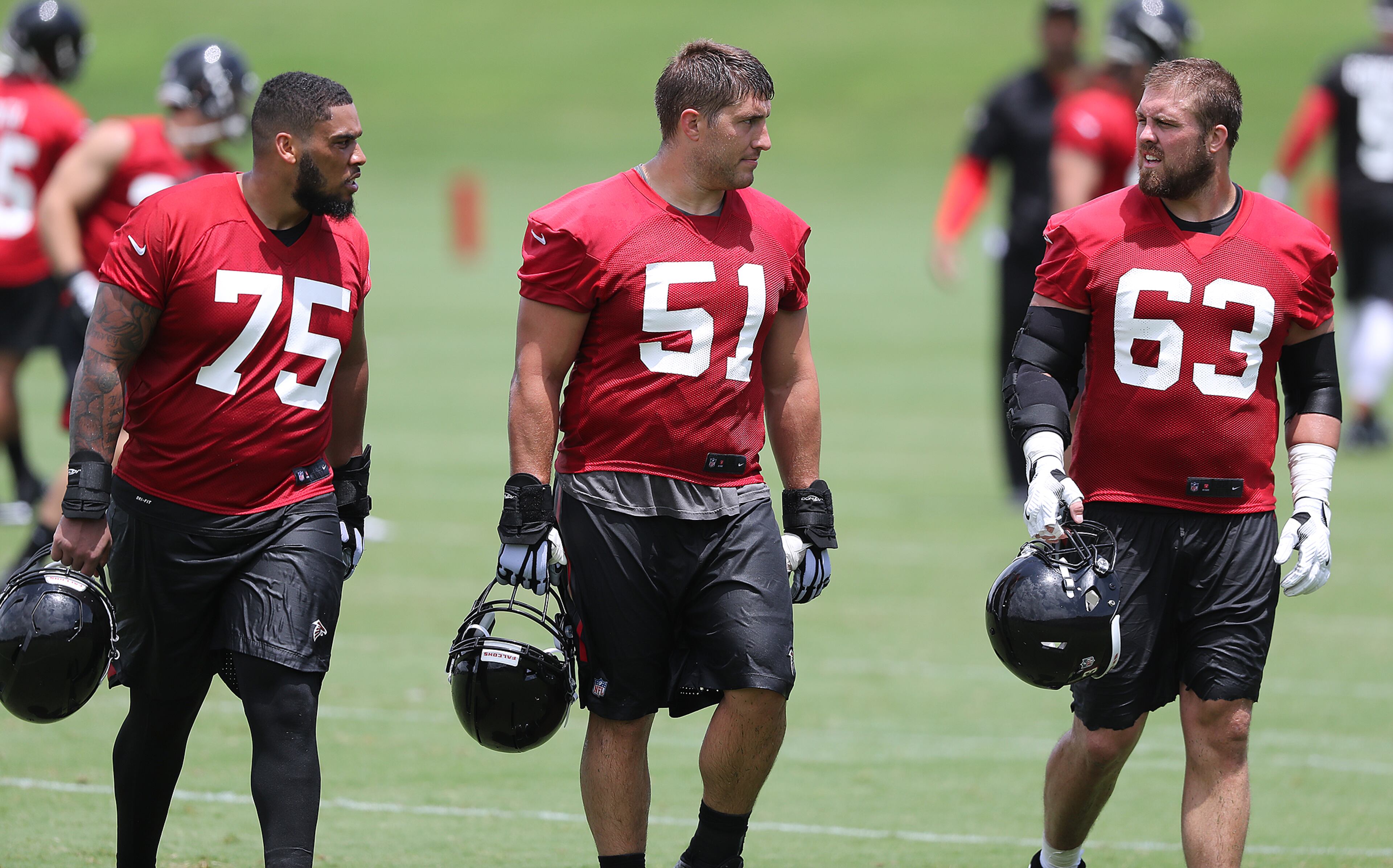 May 30, 2018 Flowery Branch: Atlanta Falcons offensive lineman Jamil Douglas (from left), Alex Mack, and Ben Garland take part in organized team activity on Wednesday, May 30, 2018, in Flowery Branch. Curtis Compton/ccompton@ajc.com