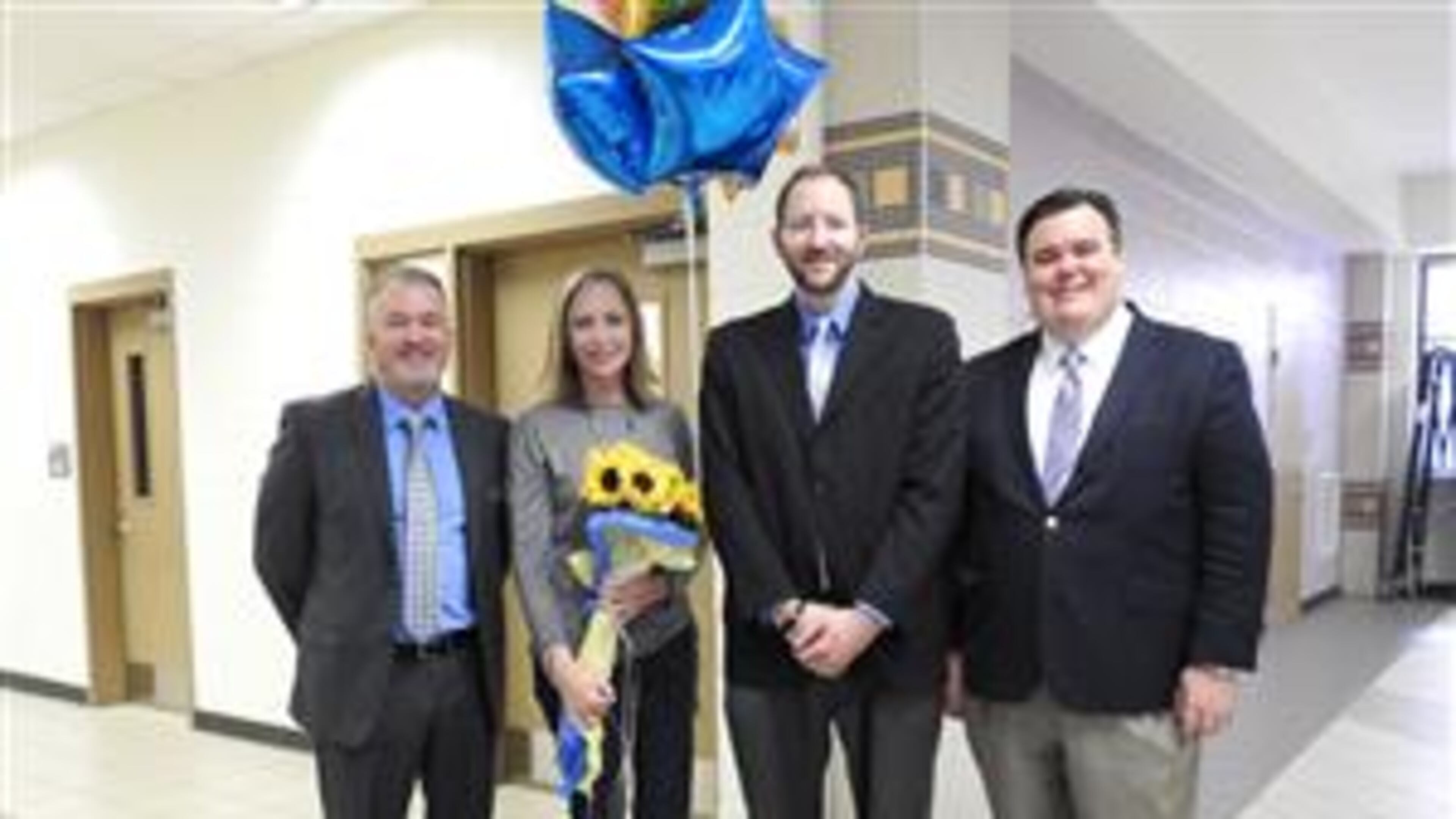 Special education instructor and middle school teacher of the year Julie Stephens got a visit from district officials.