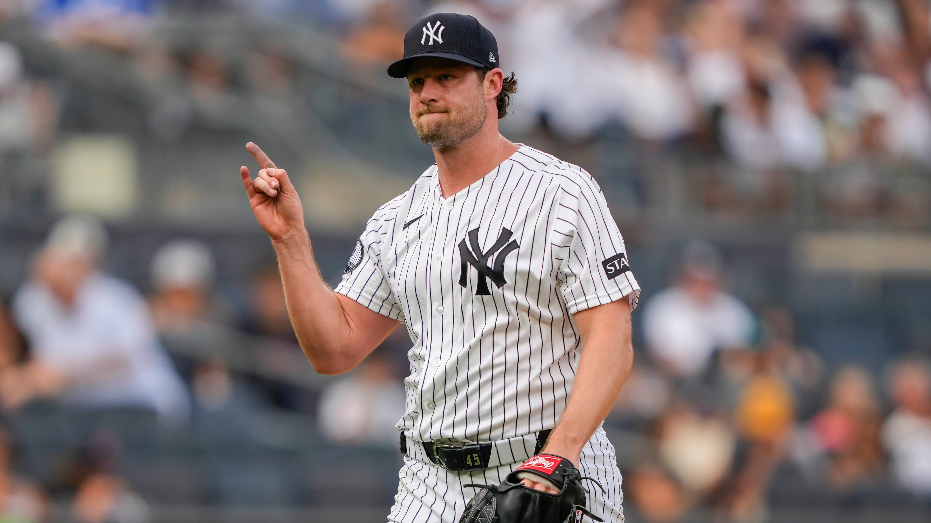 New York Yankees pitcher Gerrit Cole reacts after Atlanta Braves' Jim Jarvis strikes out during the seventh inning of a baseball game, Saturday, Aug. 8, 2026, in New York. (AP Photo/Yuki Iwamura)