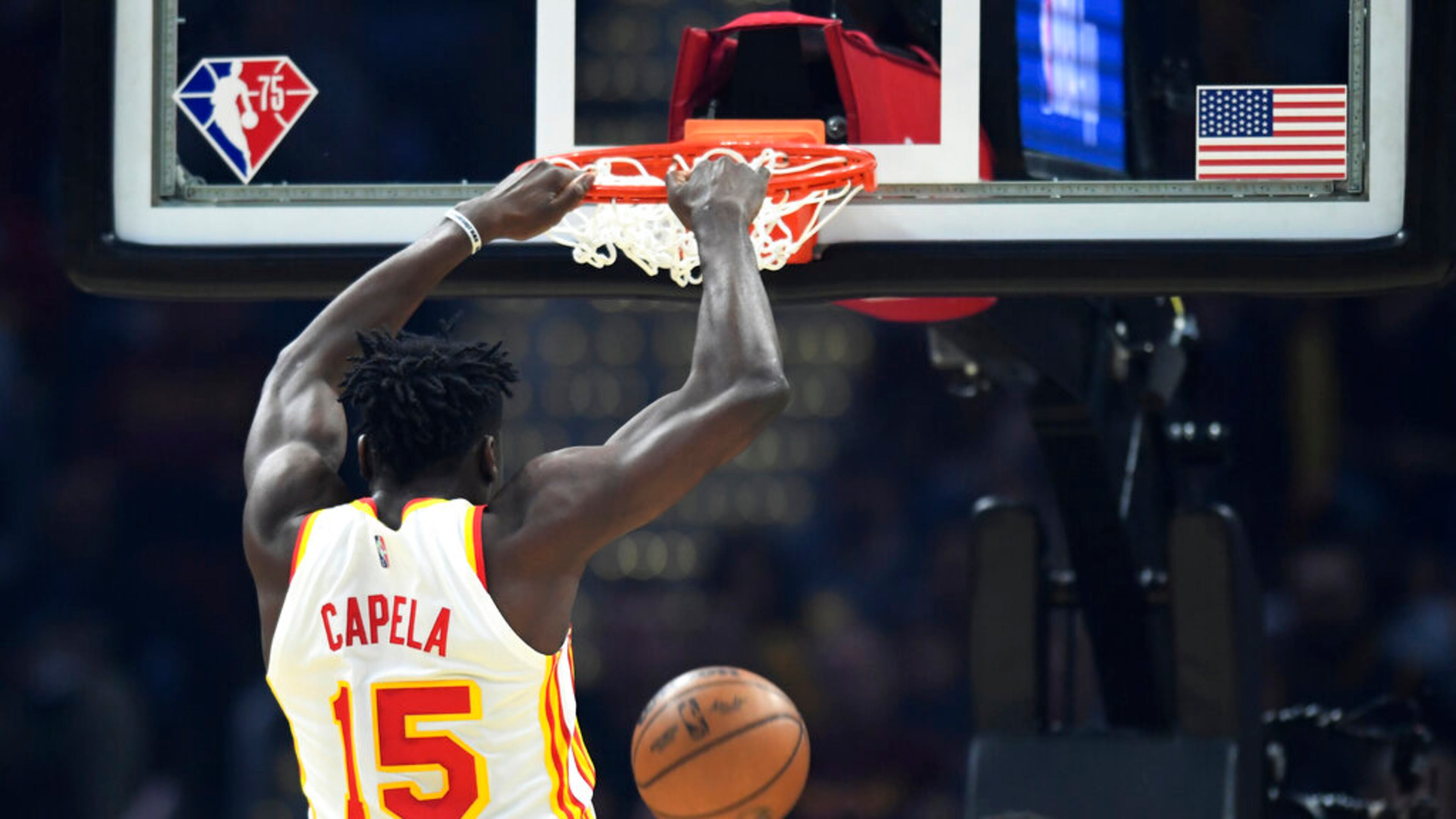 Atlanta Hawks' Clint Capela dunks during the first half of the team's NBA play-in basketball game against the Cleveland Cavaliers Friday, April 15, 2022, in Cleveland. (AP Photo/Nick Cammett)