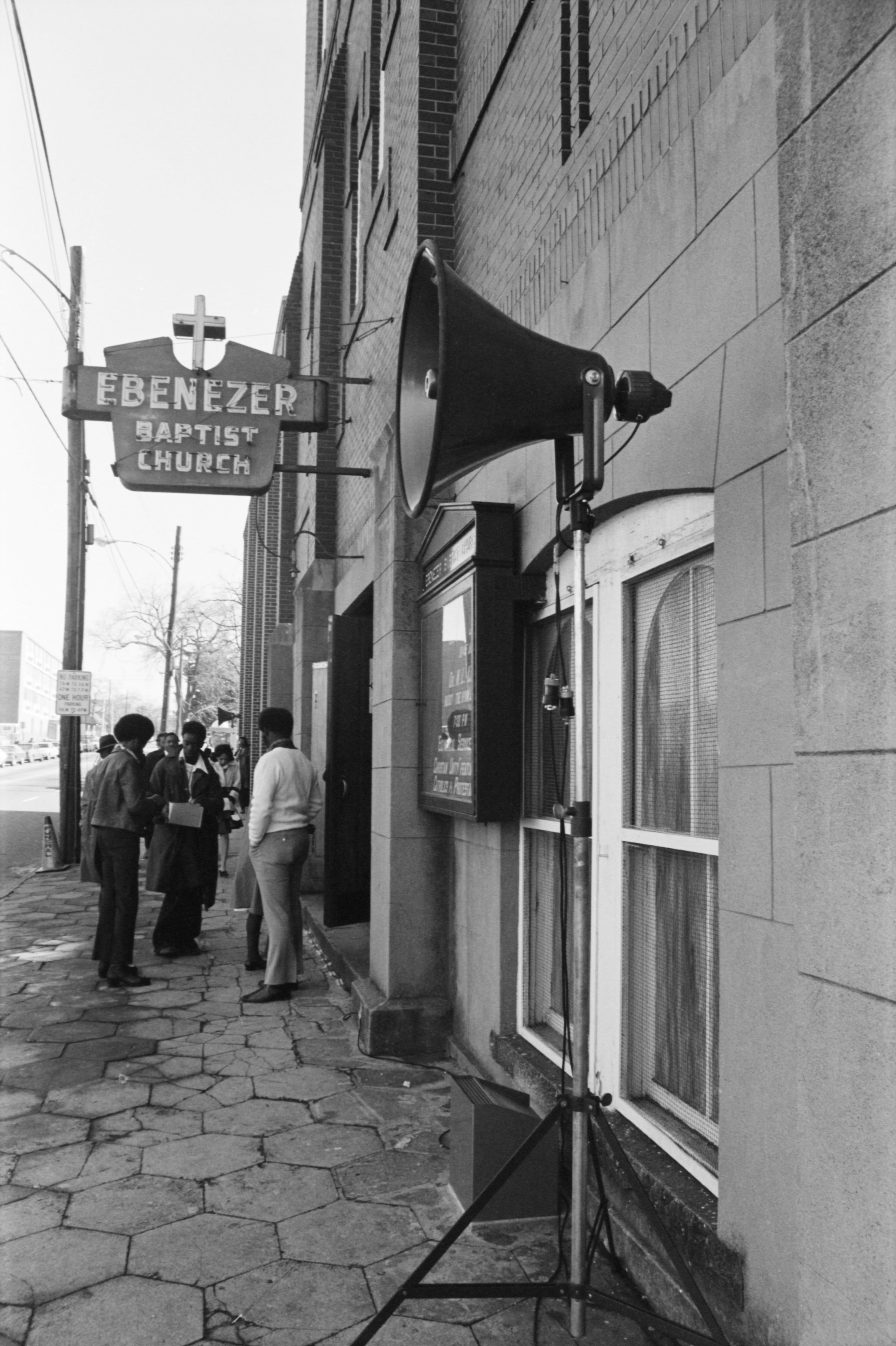 View of the exterior of Ebenezer Baptist Church during a commemorative celebration of Dr. Martin Luther King, Jr. on his birthday in 1973. Ebenezer was founded in 1886, nine years after reconstruction began. King and his father both served as pastor of the church. Photo: Boyd Lewis, courtesy of Kenan Research Center at the Atlanta History Center.