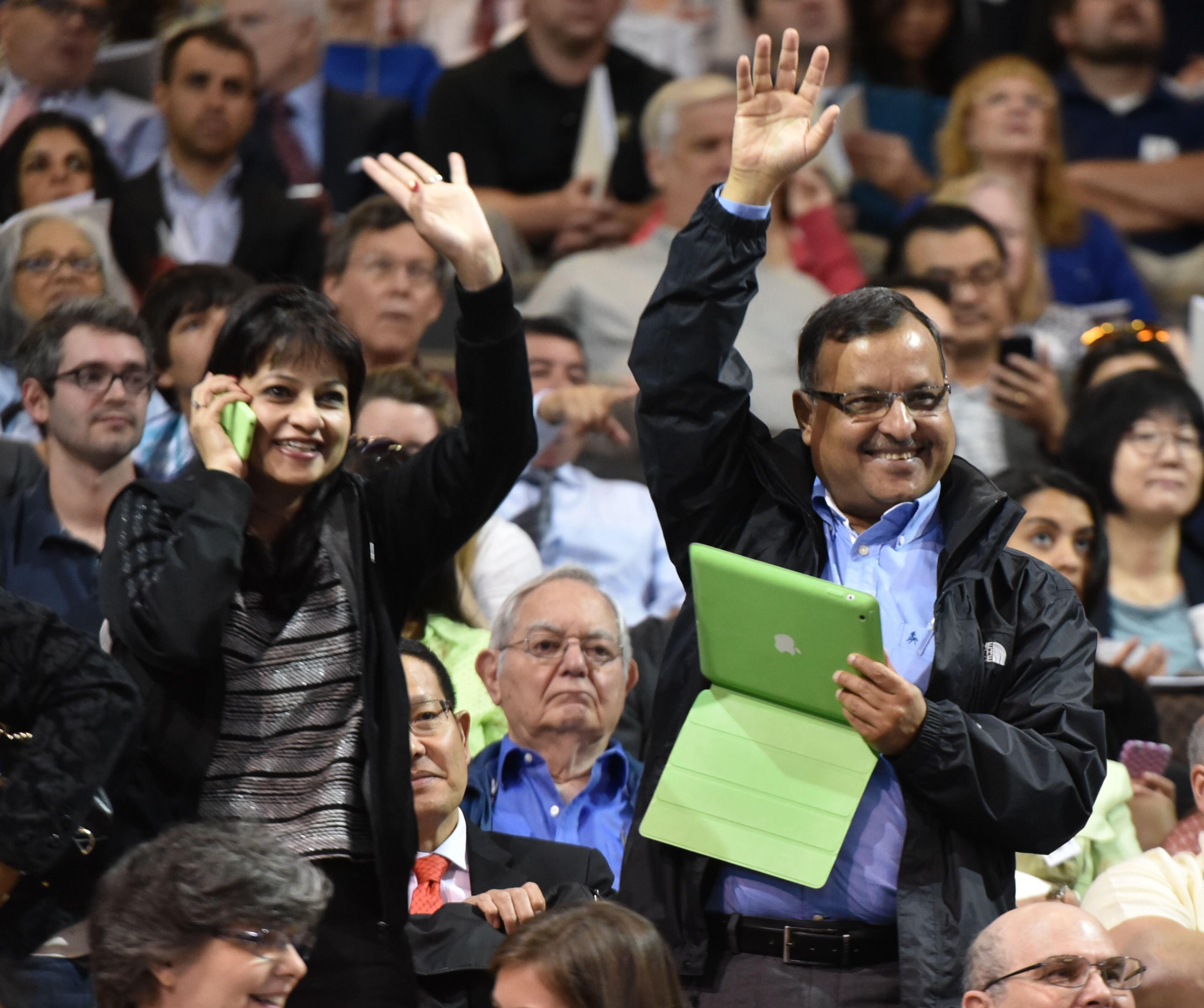 May 2, 2015 Atlanta - Family members of Georgia Tech undergraduate candidates wave during the Bachelor's morning ceremony of Spring 2015 Commencement at the McCamish Pavilion on Saturday, May 2, 2015. HYOSUB SHIN / HSHIN@AJC.COM
