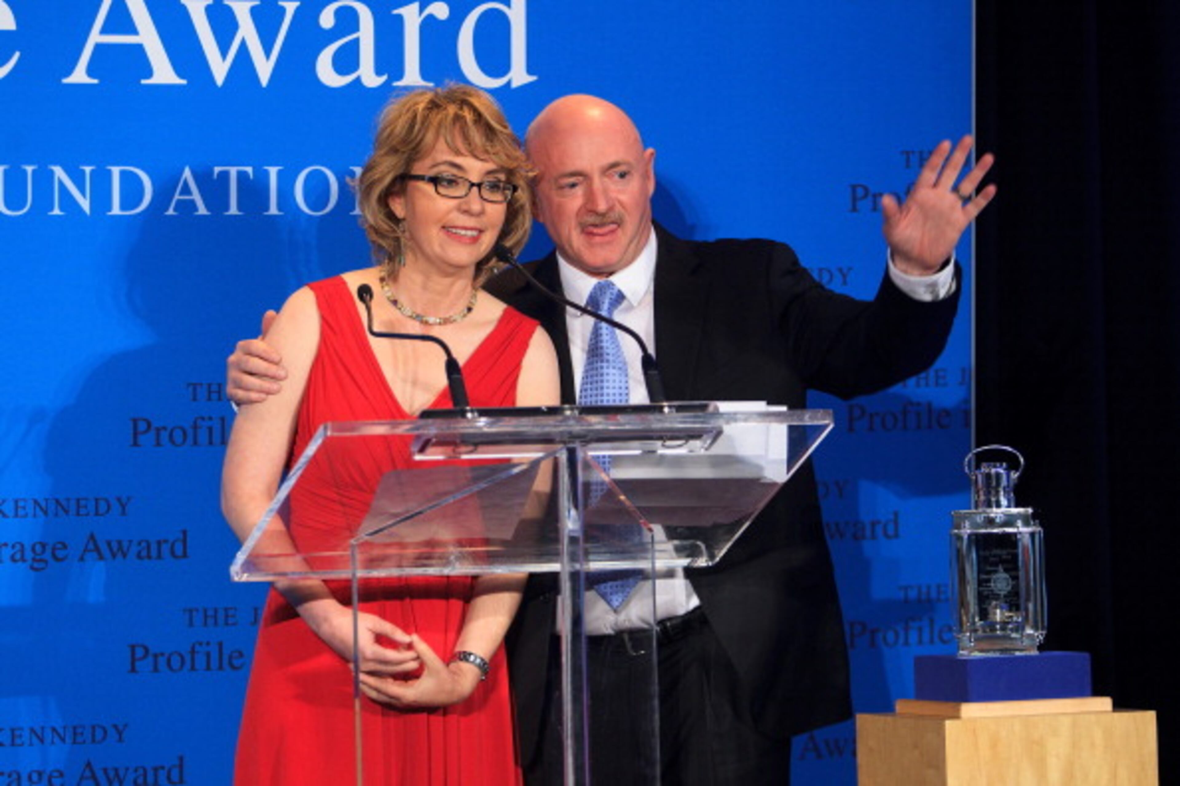 DORCHESTER, MA - MAY 5: JFK Presidential Library - Former Arizona Congresswoman and co-founder of Americans for Responsible Solutions Gabrielle Giffords was honored by Caroline Kennedy, President of the Kennedy Library Foundation, with the 2013 John F. Kennedy Profile in Courage Award on May 5, 2013 at the JFK Presidential Library. Giffords was accompanied by her husband, Captain Mark Kelly (US Navy - Ret.), co-founder of Americans for Responsible Solutions. The JFK Profile in Courage Award is presented annually to public servants who have made courageous decisions of conscience without regard for the personal or professional consequences. (Photo by Dina Rudick/The Boston Globe via Getty Images)