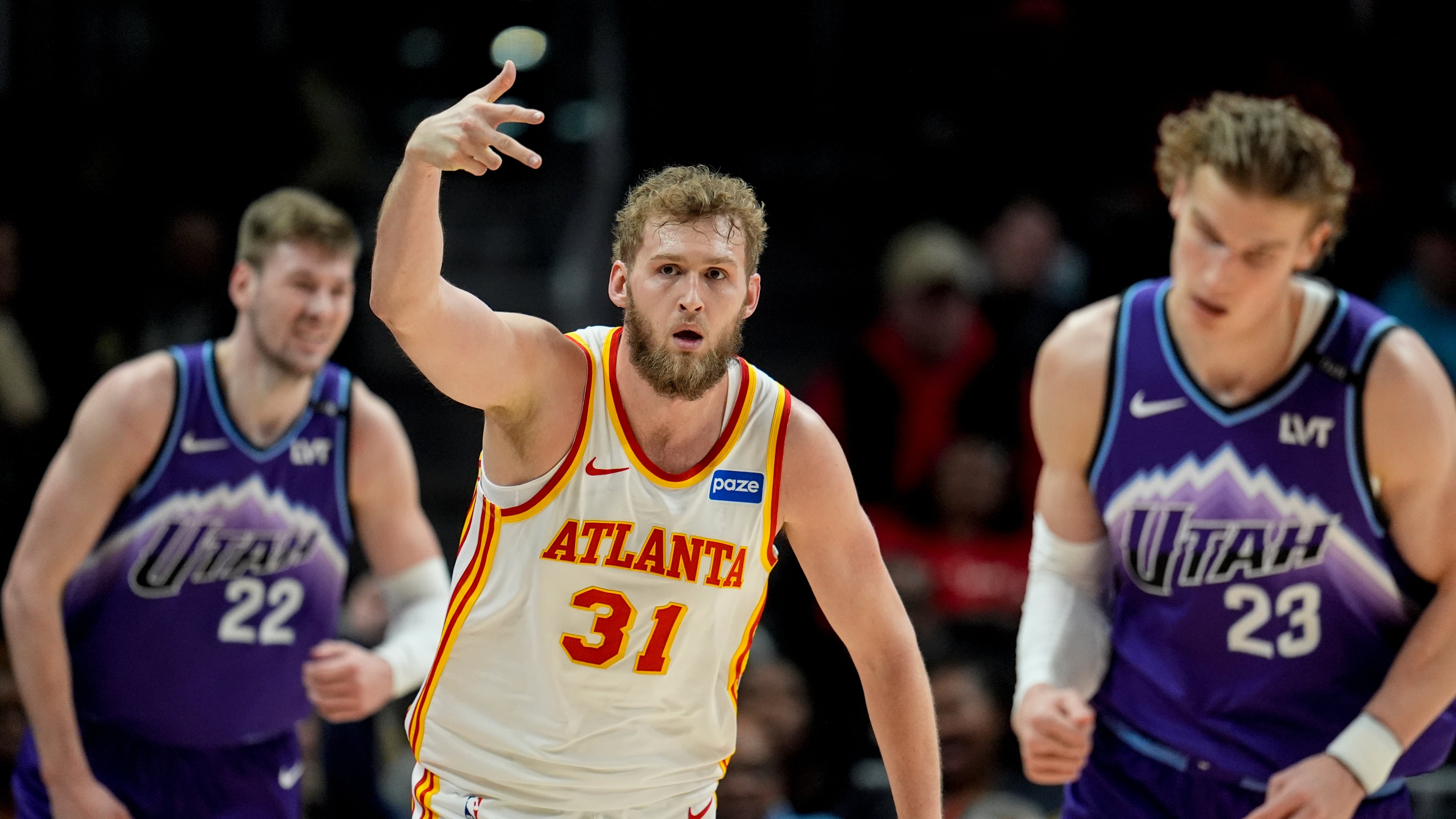Atlanta Hawks center Jock Landale (31) celebrates his three-poing shot against the Utah Jazz during the first half of an NBA basketball game, Thursday, Feb. 5, 2026, in Atlanta. (AP Photo/Mike Stewart)