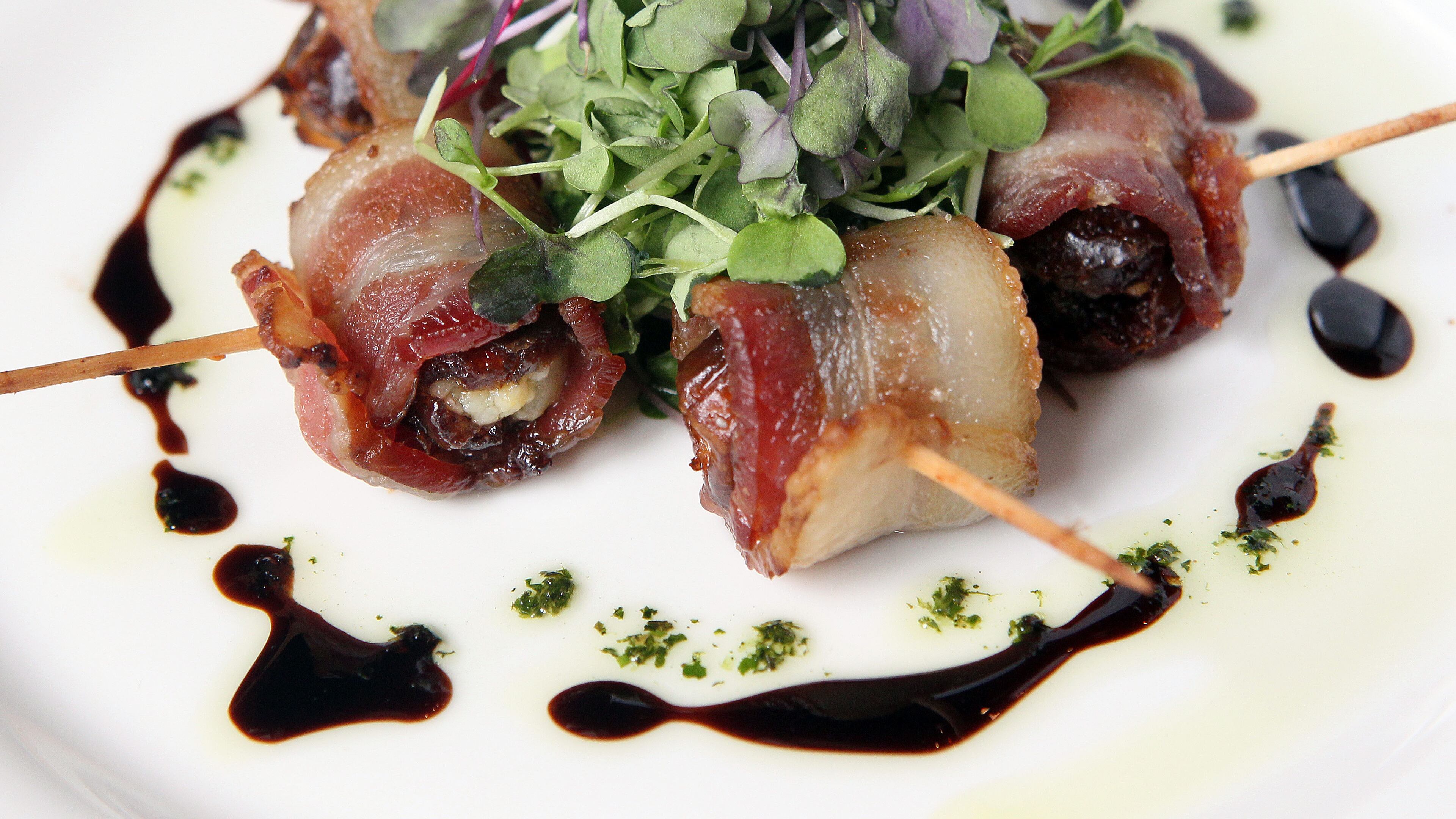 Bacon Wrapped Dates at Cinebistro. Photo: Phil Skinner, pskinner@ajc.com