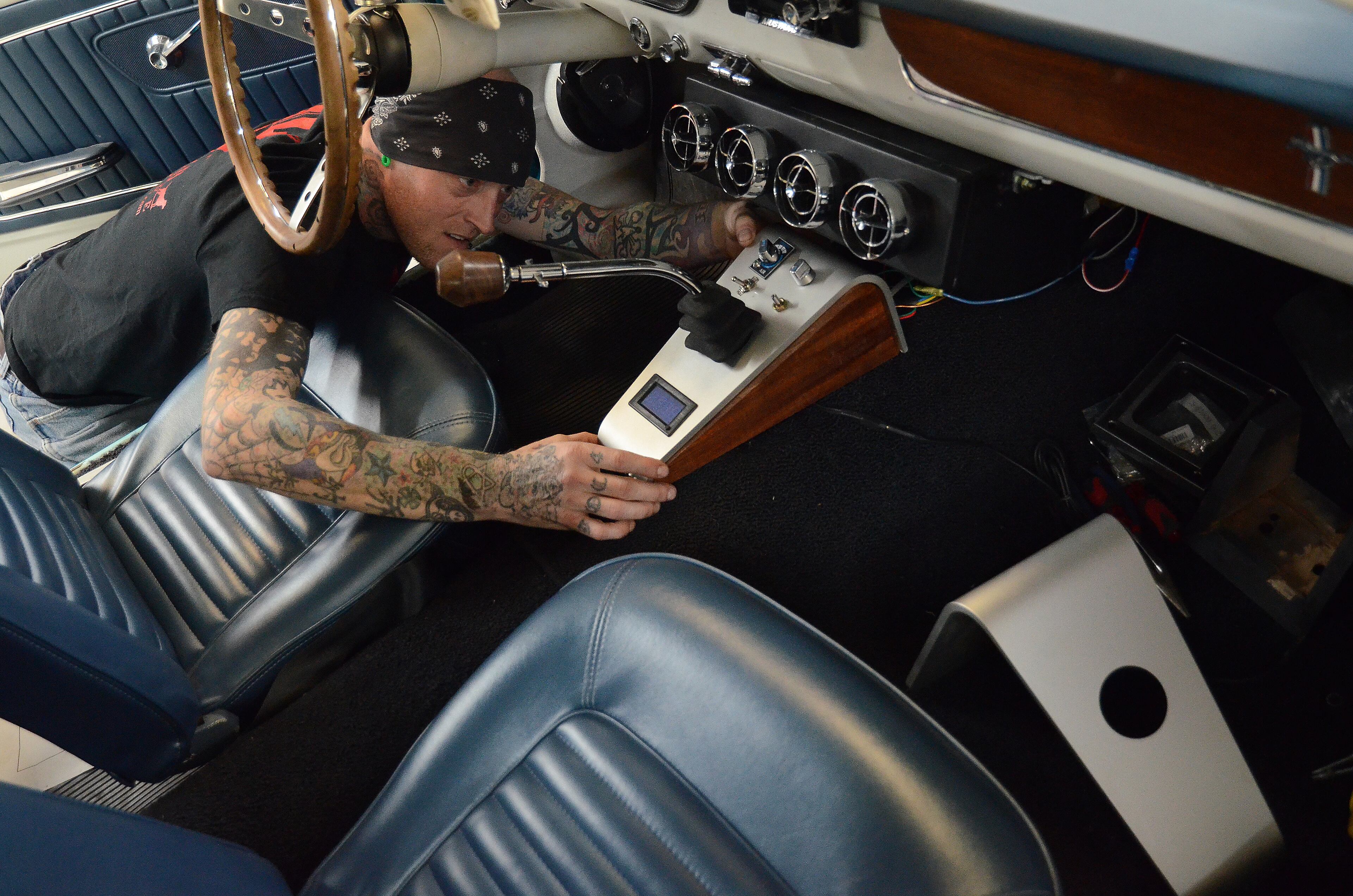 Ferguson installs a custom control console made from a repurposed computer part on a special restoration of the 1965 Mustang.
