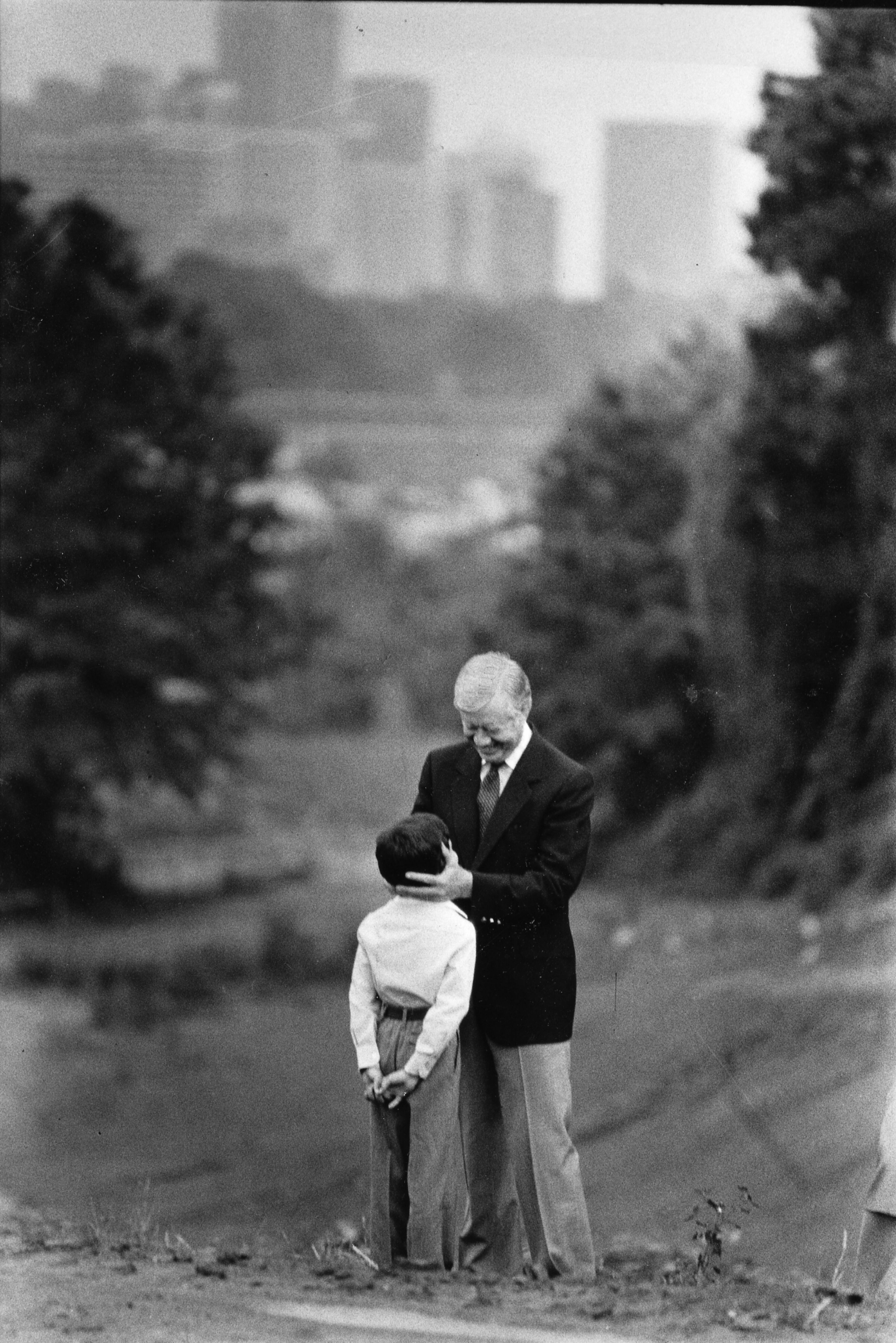 Former President Jimmy Carter shares a smile with his grandson, James, just before the ground-breaking for a Japanese garden at the $26 million Carter Presidential Library now under construction east of downtown Atlanta.