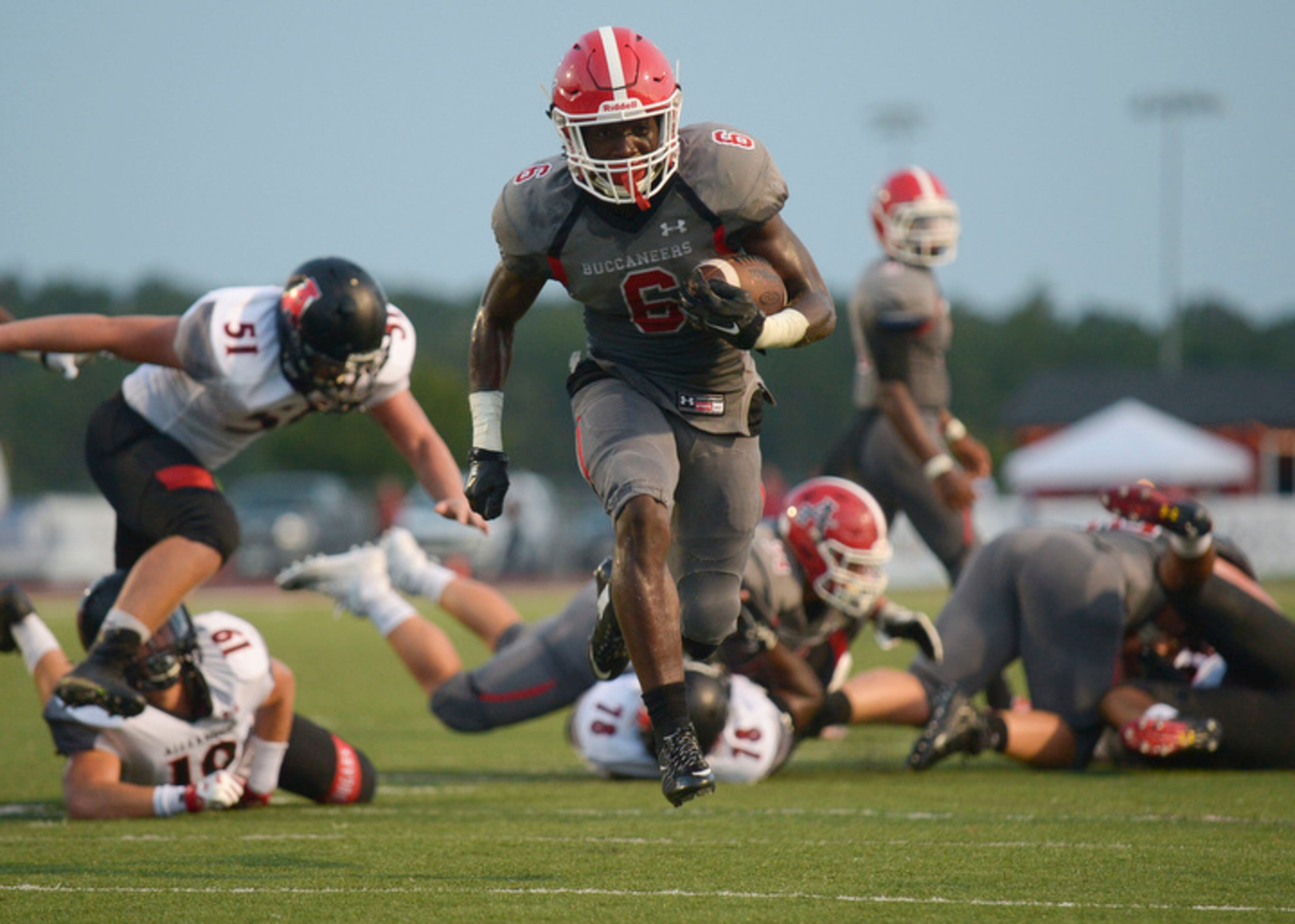 Allatoona senior RB Adrian Boyd (6) runs for a touchdown in the first half of his game against Alexander Friday, August 25, 2017.