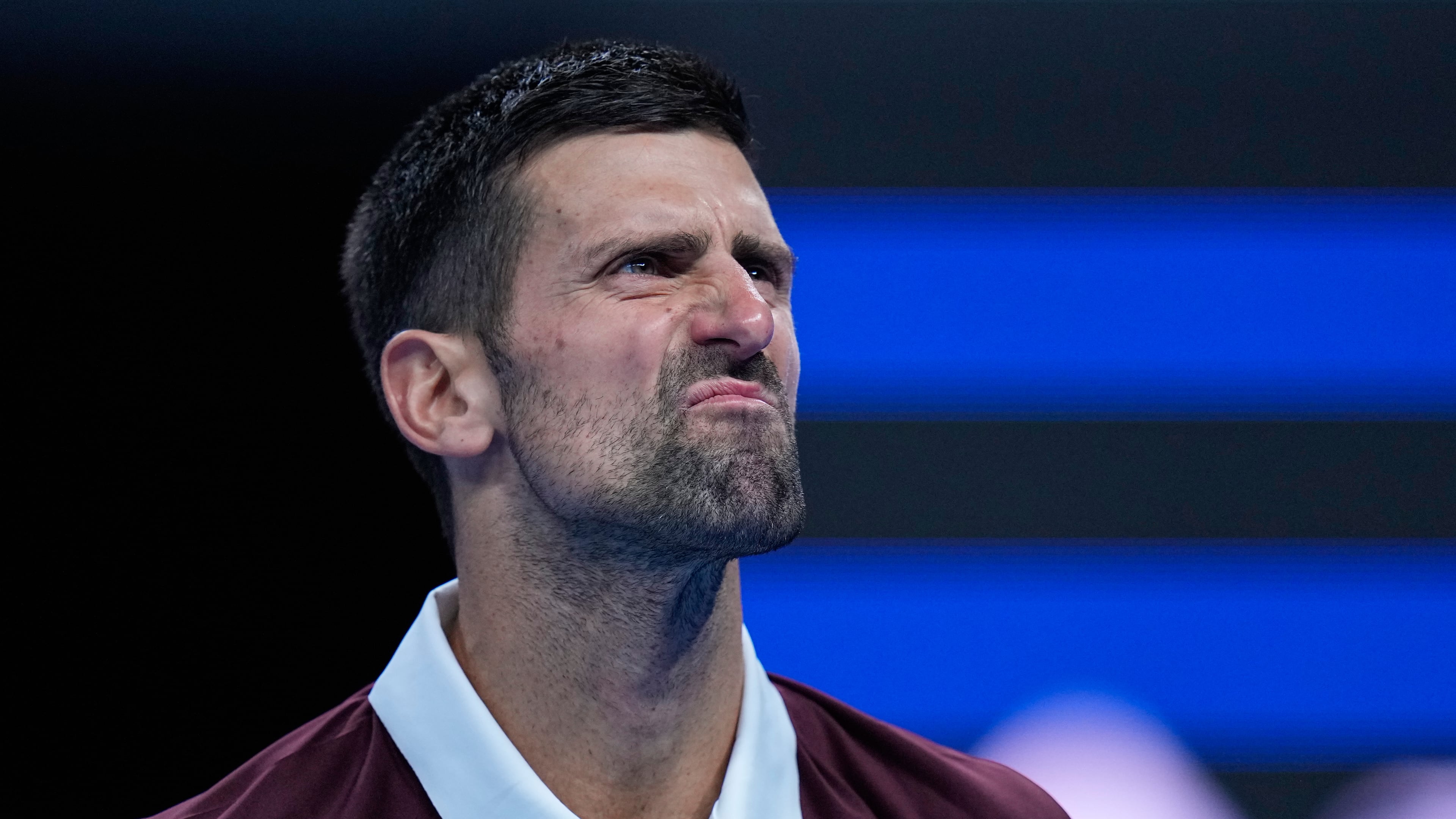 Novak Djokovic, of Serbia, reacts during the men's single semi-final match against Daniil Medvedev, of Russia, at the China Open tennis tournament in Beijing, Monday, Oct. 5, 2026. (AP Photo/Andy Wong)