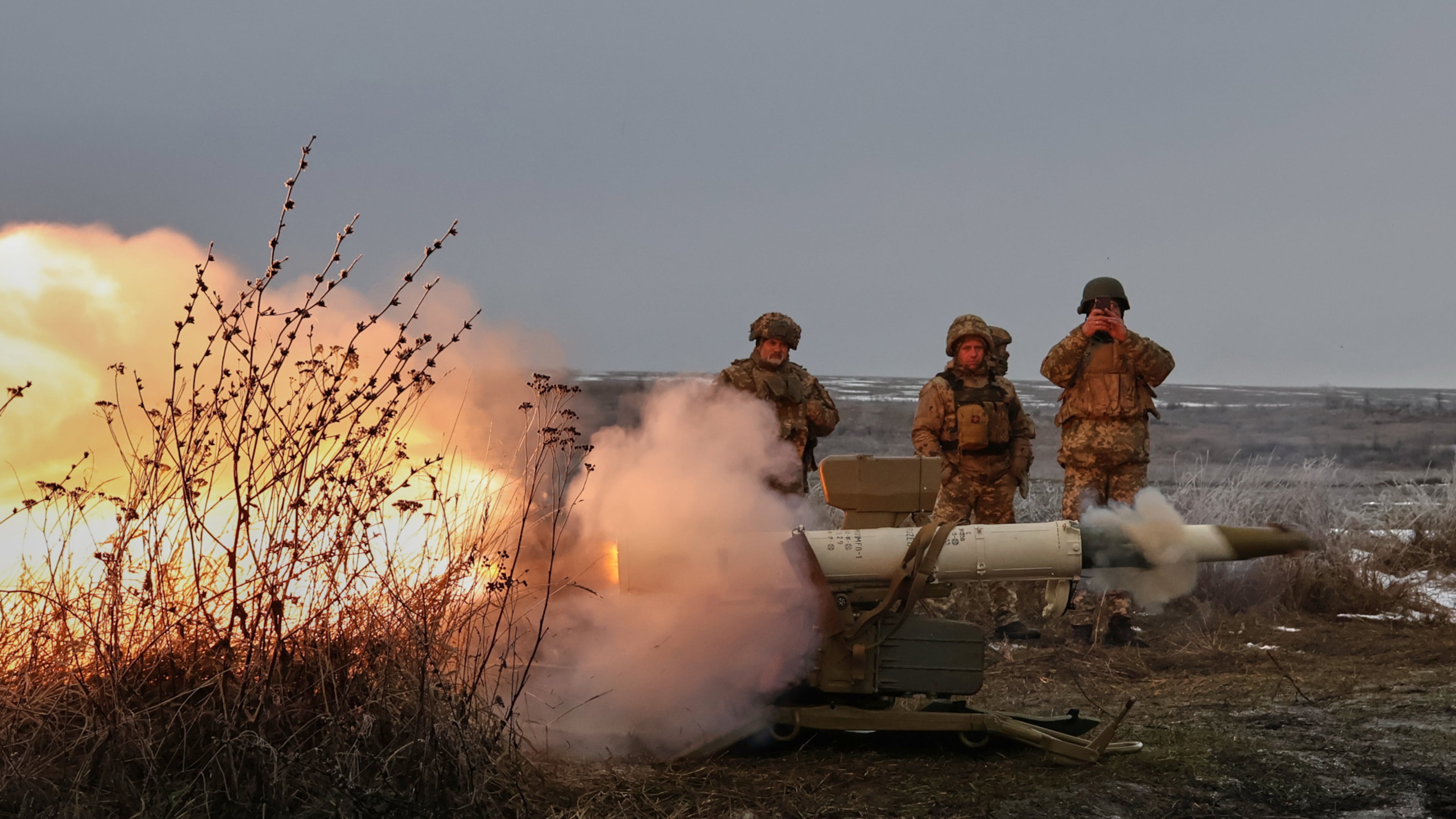 In this photo provided by Ukraine's 65th Mechanized Brigade press service, soldiers fire an anti-tank missile system during a drill close to the frontline on the site of heavy battles with the Russian troops in the Zaporizhzhia region, Ukraine, Sunday, Jan. 4, 2026. (Andriy Andriyenko/Ukraine's 65th Mechanized Brigade via AP)