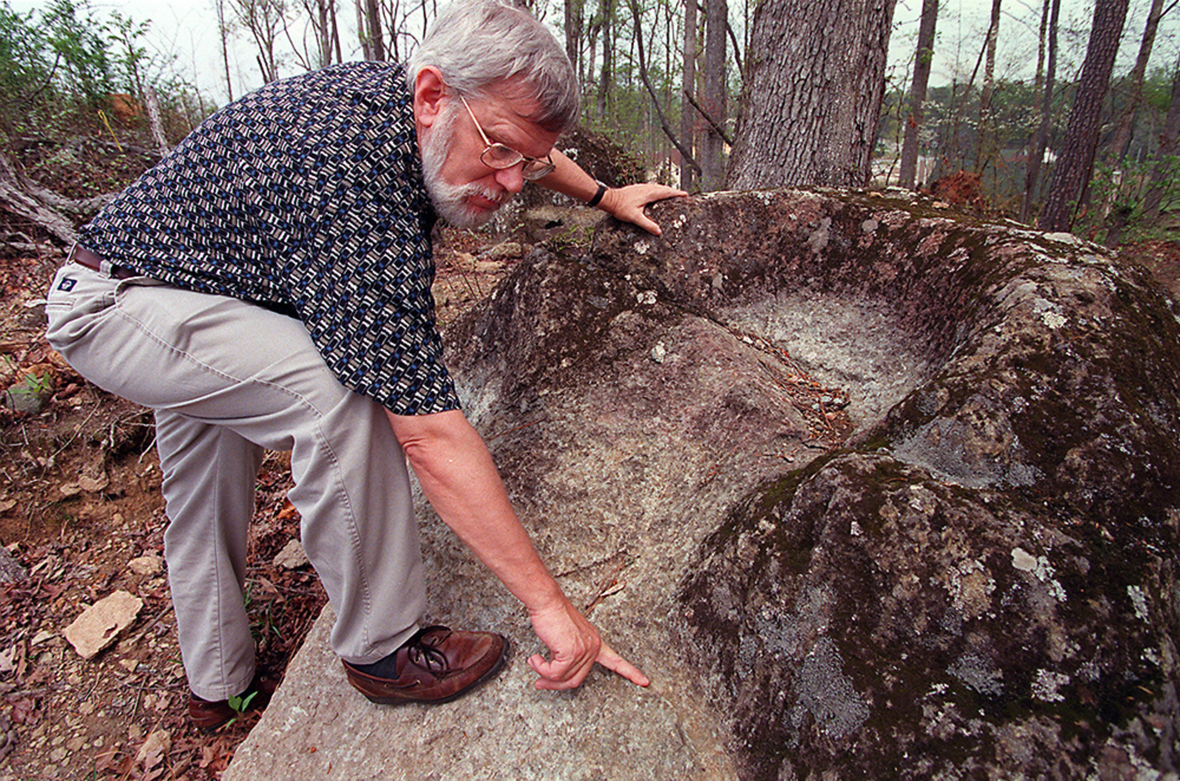 Soapstone Ridge: About 3,500 years ago, prehistoric people used outcroppings of a soft rock called soapstone to carve out bowls. Some of these rock carvings can still be found along a two-mile ridge near I-285 and I-675, known as Soapstone Ridge. Some homes in the area have incorporated these stones into their landscaping. Other quarries from the Late Archaic period have been found in Gwinnett and near Stone Mountain. (DAVID TULIS / AJC file)