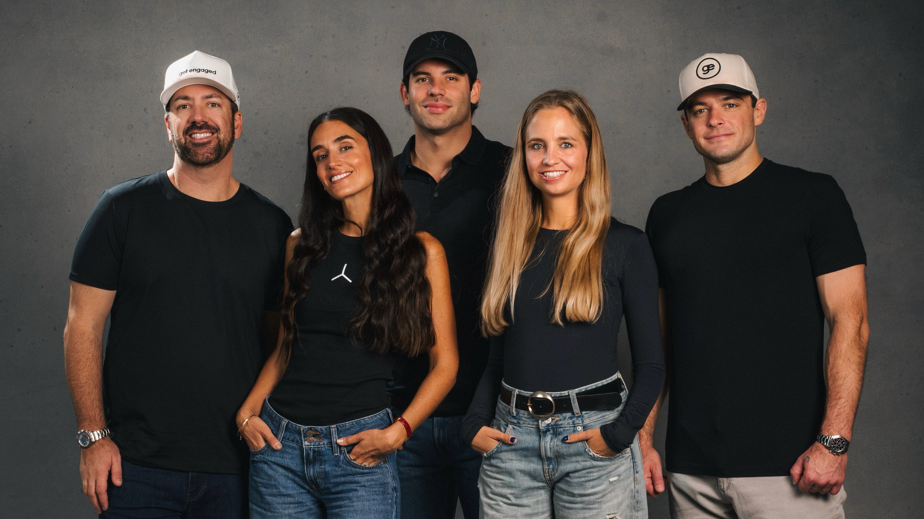 Buckhead-based Get Engaged is being acquired by global marketing company SAMY. Pictured are Get Engaged cofounders (behind, from left) Alex Dermer, Cam Fordham, and Ben Hiott and SAMY cofounders (in front, from left) Marta Nicolás and Patricia Ratia. (Courtesy of Get Engaged)