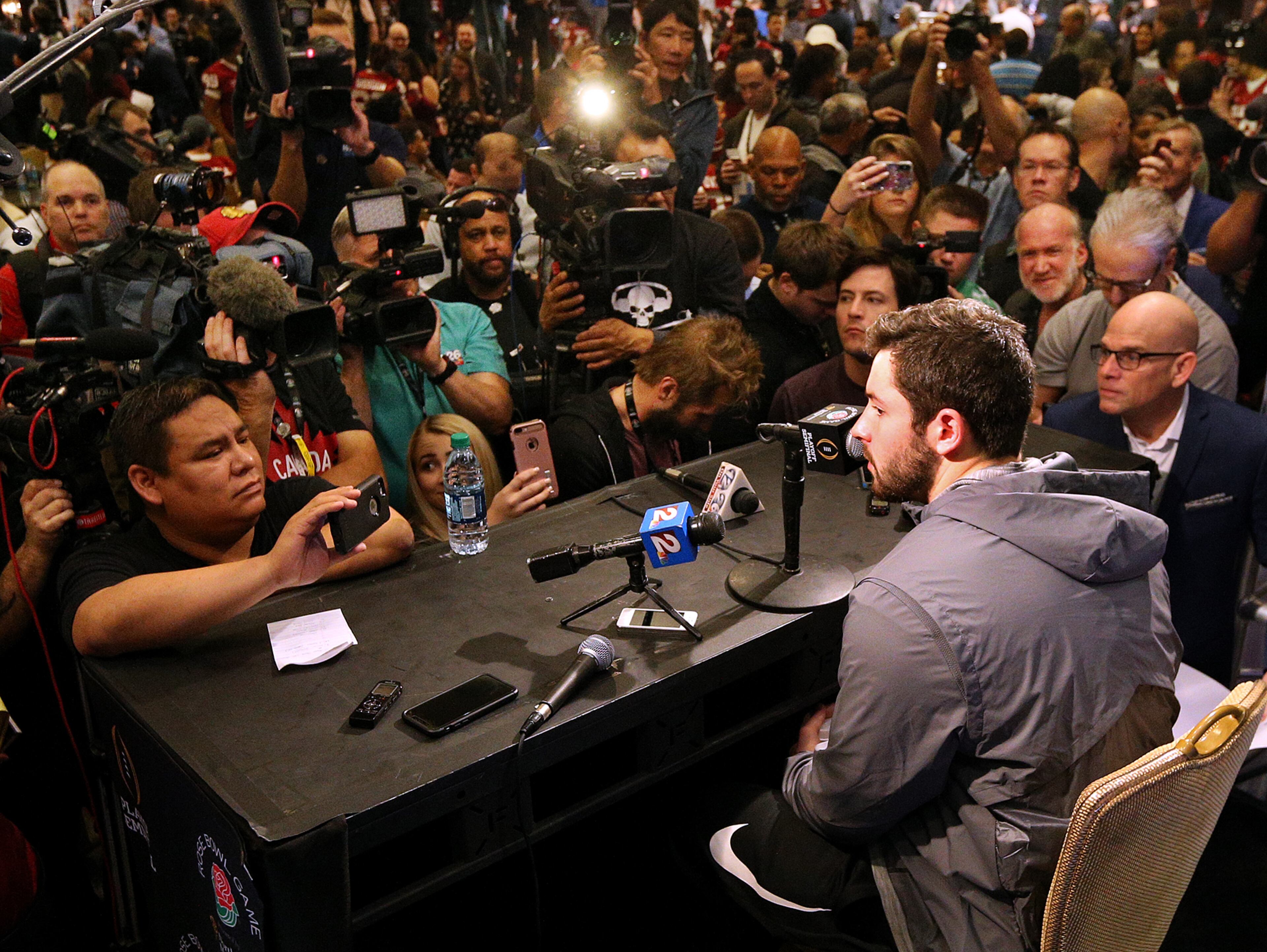 December 30, 2017 Los Angeles: Oklahoma quarterback Baker Mayfield, battling a flu-like illness, makes his first media appearance showing up late for the last 20 minutes of his teamâs Media Day for the Rose Bowl Game on Saturday, December 30, 2017, in Los Angeles. Curtis Compton/ccompton@ajc.com