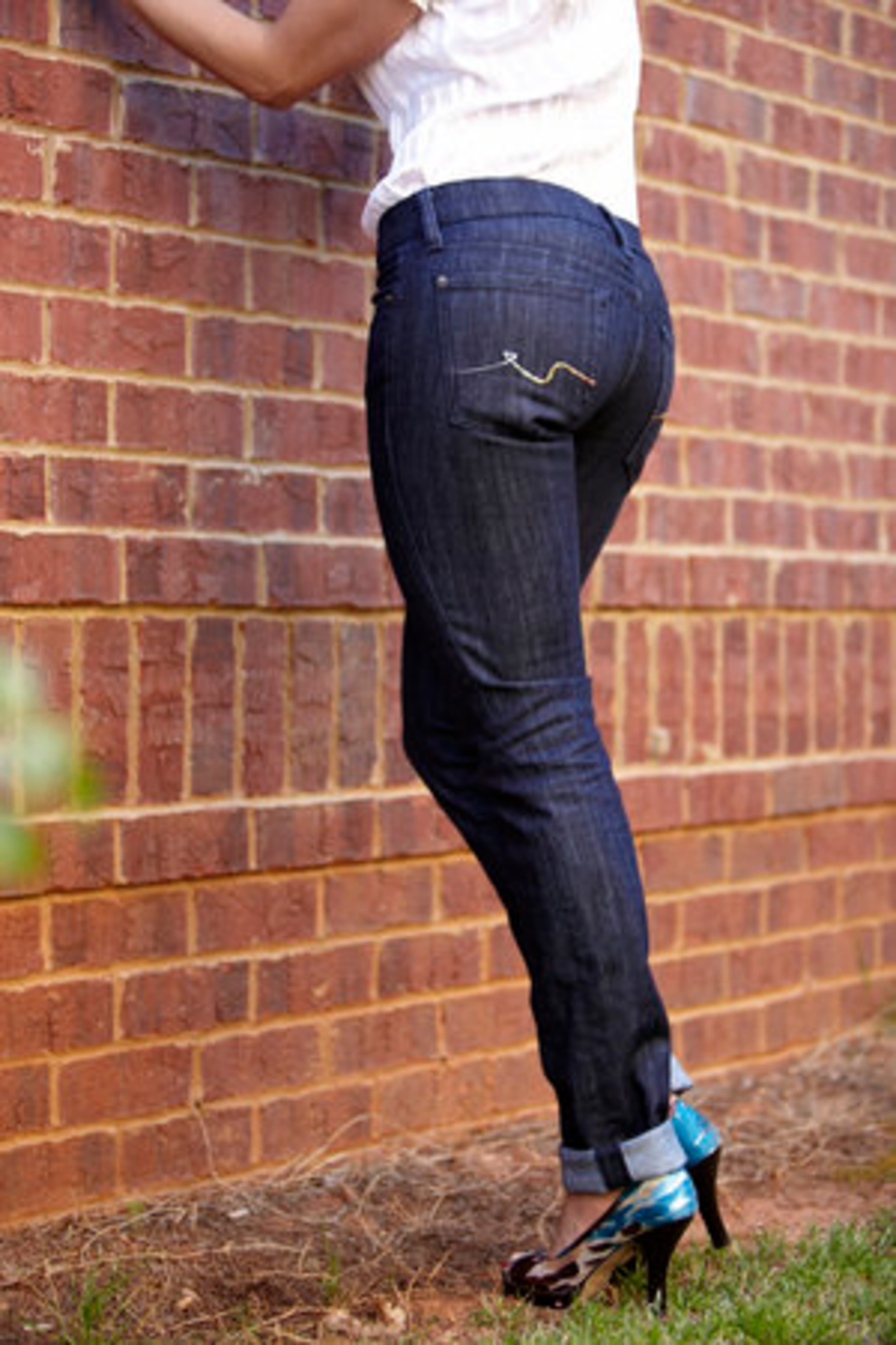 Brandao, who owns a large collection of 7 for All Mankind Jeans, shows off this pair in a dark blue wash.